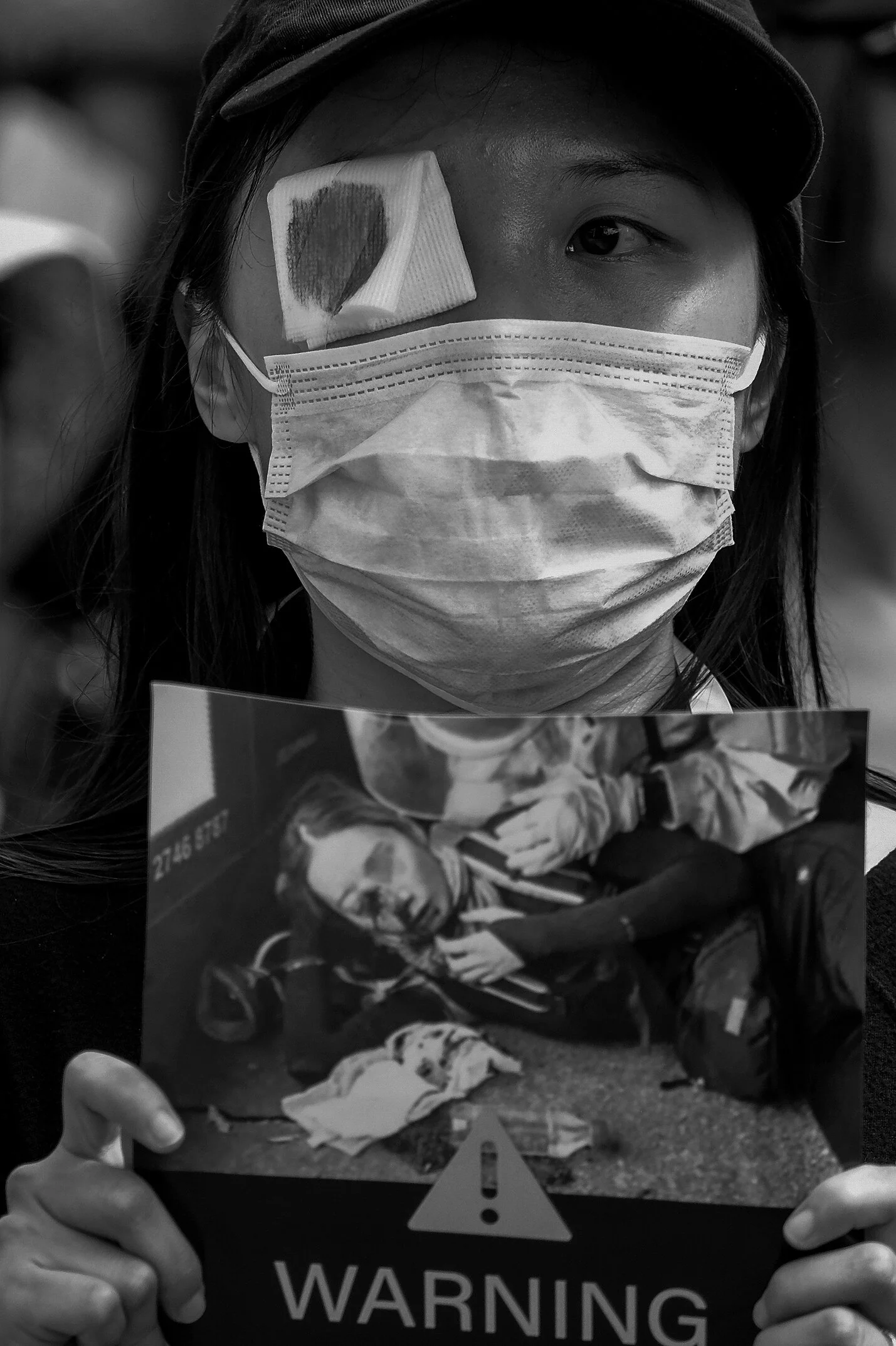  A protester marches at Third Street Promenade on Saturday, August 17, 2019, in Santa Monica, California. Hundreds supporters stage a ``slow march protest'' against Hong Kong police brutality that has emerged as a result of civil opposition to the Ho