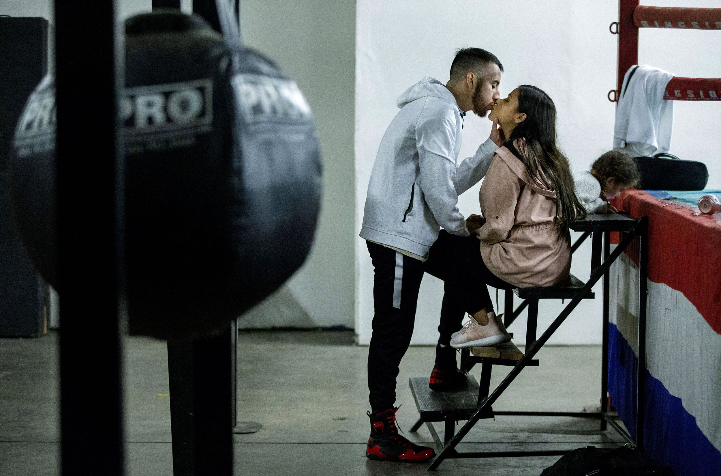  Boxer Carlos Saucedo, 23, of Fontana spends some quite time with girlfriend Crystal Munoz, 21, at M.T.C. Boxing Club four days before the his fight after his nightly workout in San Bernardino on Tuesday, February 12, 2019. PUBLISHED Feb. 21, 2019 