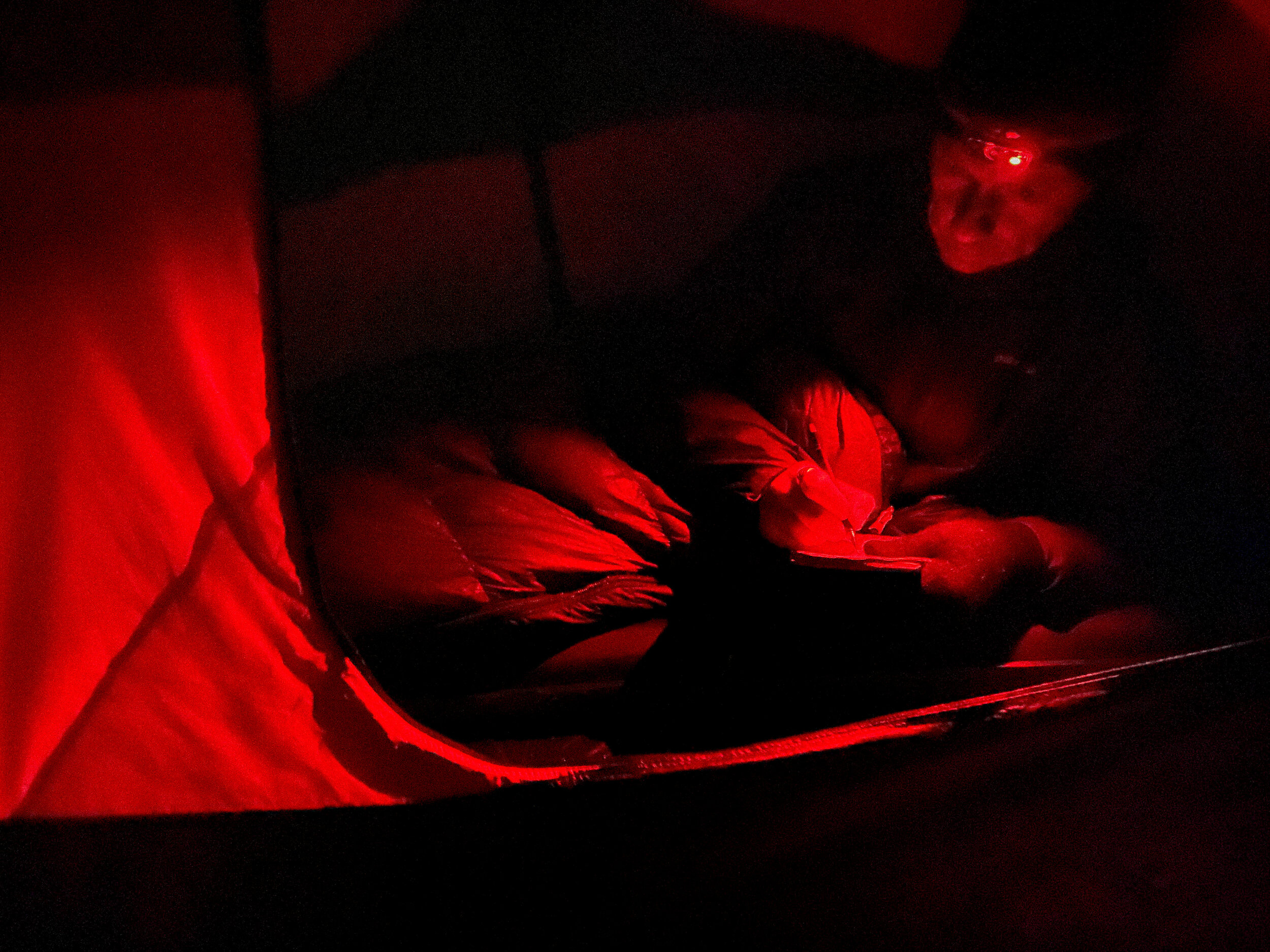 Walk of Remembrance - Albert Willner writes down some notes at their campsite on the shore of Lake Otmuchowskie, Poland. Though the weather was not nearly so severe as the winter of 1944-45 temperatures dipped below freezing at night and in the ear