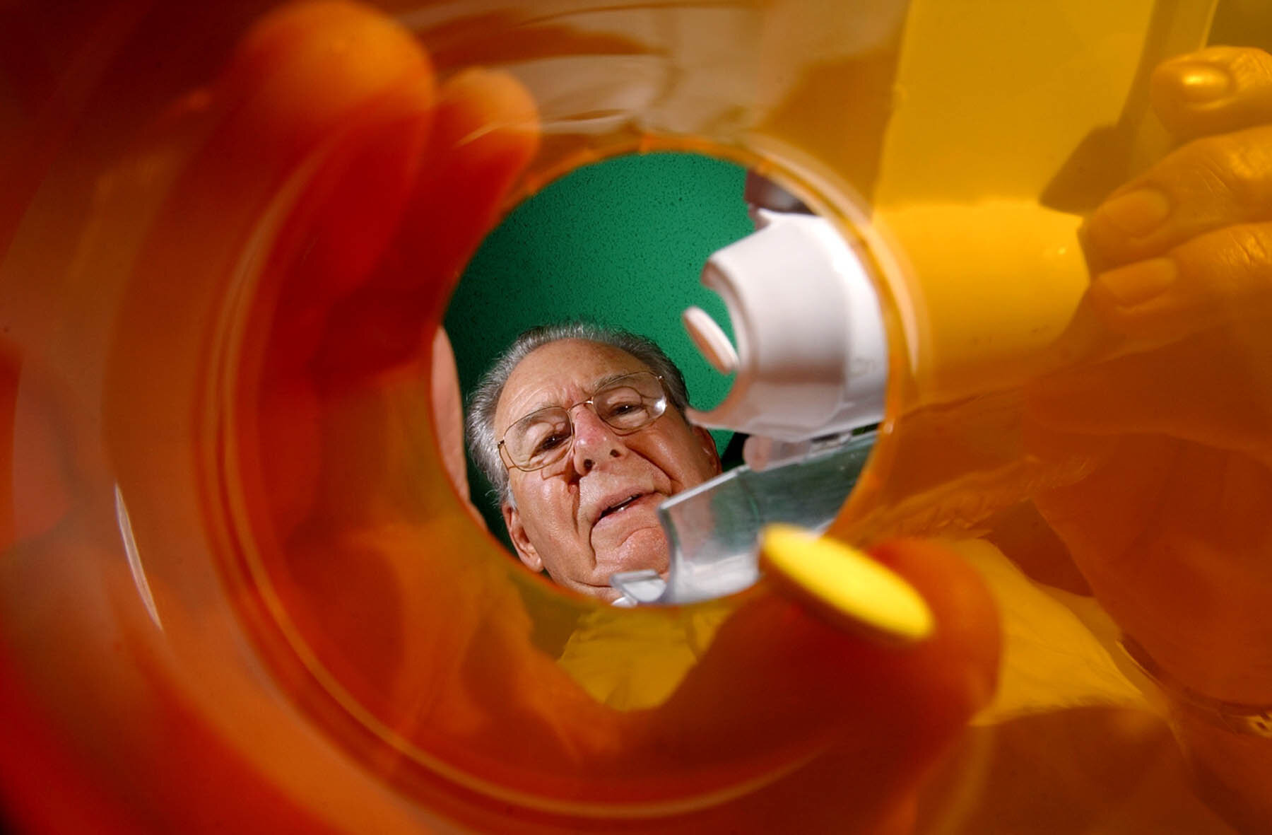  Pharmacist Richard Lachman, 77, of Corona has been busy over the years in the community and still fills the bottles at Pharmacy Express in Rubidoux. 1-1-2005 