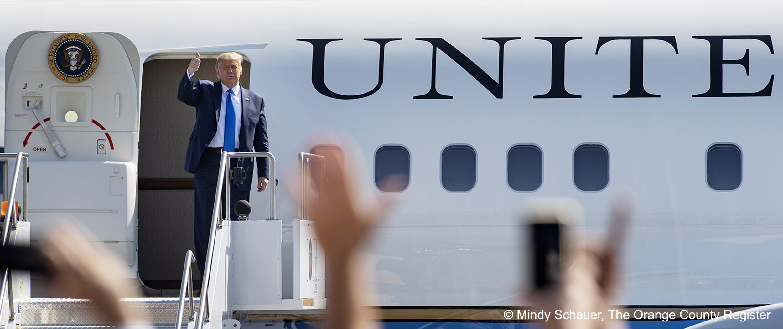  President Trump emerges from Air Force One after landing at John Wayne Airport in Santa Ana on Sunday, October 18, 2020.  