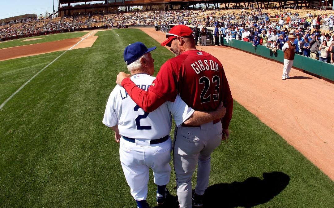  Hall of Fame and former Los Angeles Dodgers manager Tommy Lasorda passed away at the age of 93. Los Angeles Dodgers manager Tommy Lasorda and former Dodger great and current Arizona Diamondbacks bench coach Kirk Gibson (23) share a moment before a g