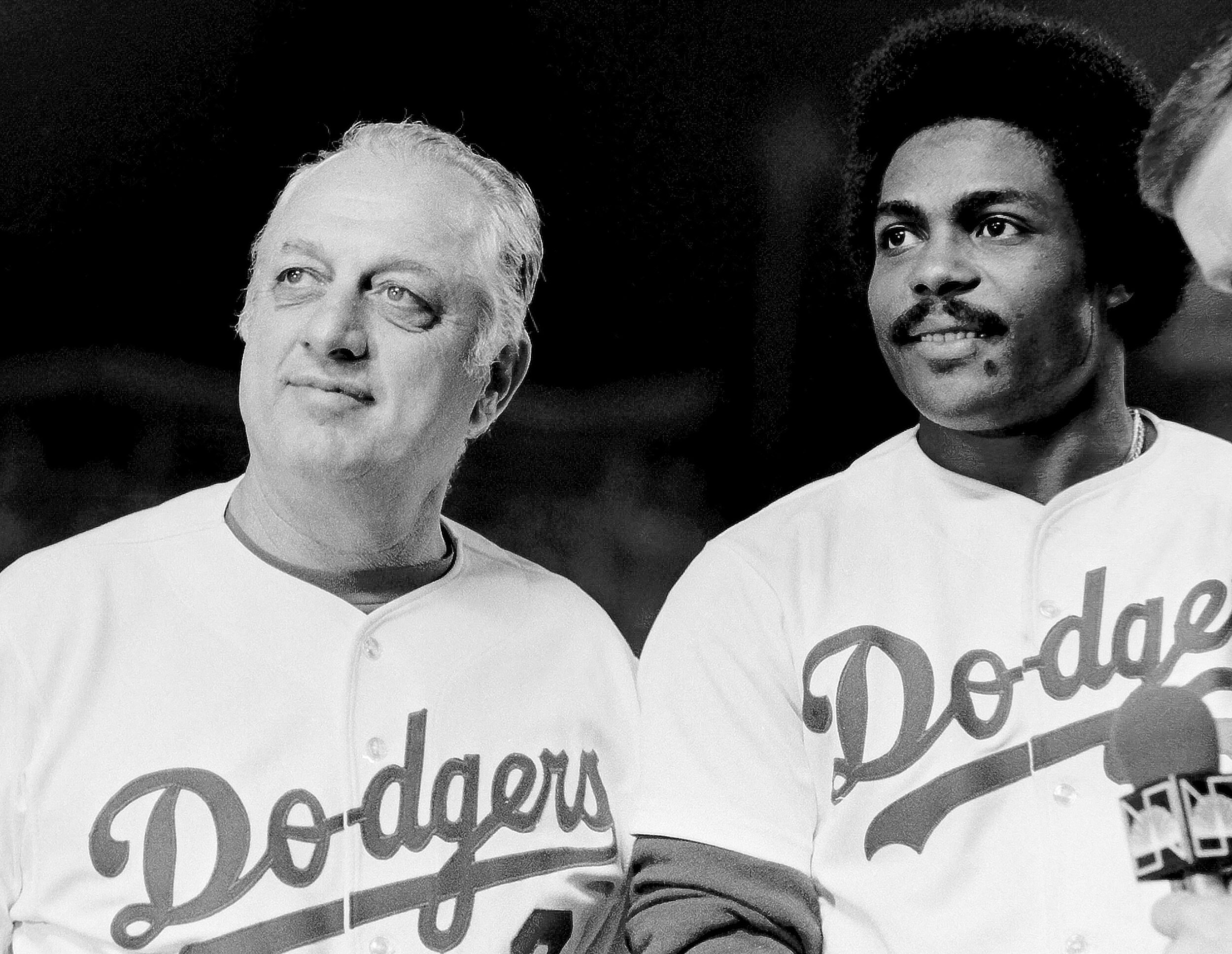  LOS ANGELES, CA - OCTOBER 10, 1981: Manager Tommy Lasorda and Pedro Guerrero #28 of the Los Angeles Dodgers are interviewed after defeating the Houston Astros during the 1981 National League Division Series at Dodger Stadium, Los Angeles, California