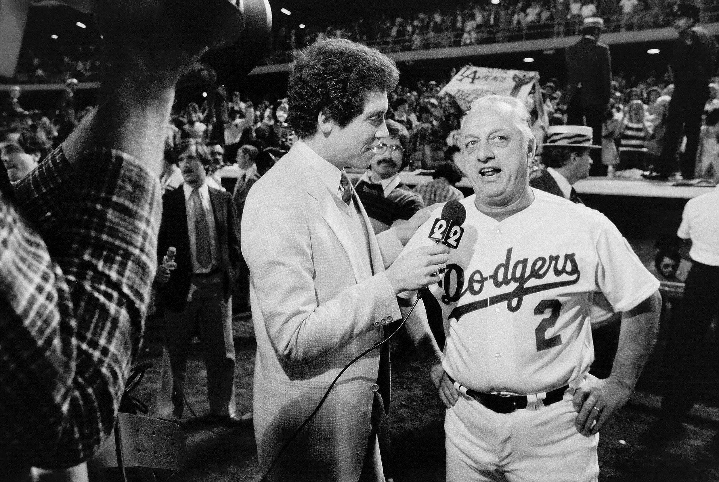  LOS ANGELES, CA - OCTOBER 10, 1981: Manager Tommy Lasorda  of the Los Angeles Dodgers is interviewed by Roy Firestone defeating the Houston Astros during the 1981 National League Division Series at Dodger Stadium, Los Angeles, California. (Photo by 