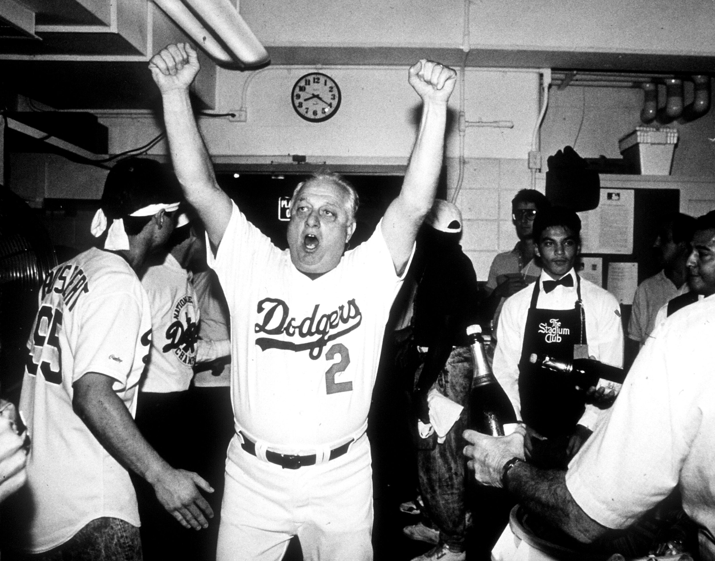  LOS ANGELES, CA - 1988 :  Manager Tommy Lasorda #2 of the Los Angeles Dodgers celebrates after winning the 1988 NLDS at Dodger Stadium, Los Angeles, California.  (Photo by Jayne Kamin-Oncea/Getty Images)  