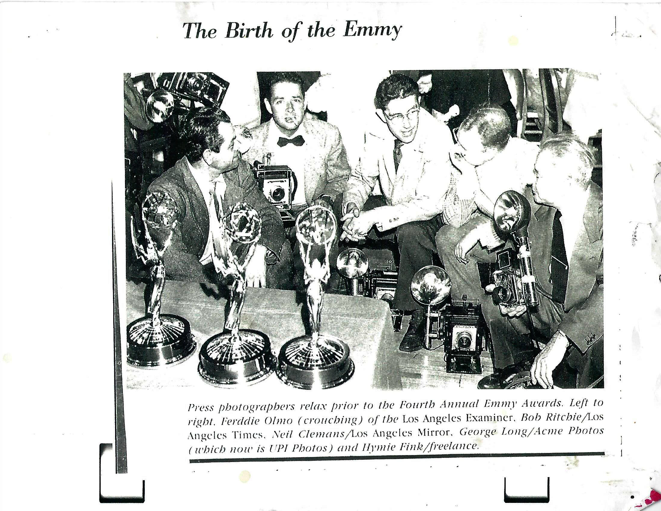  They didn't win these, but they photographed the event. The names are in the caption. It it was the 4th Emmy awards. 