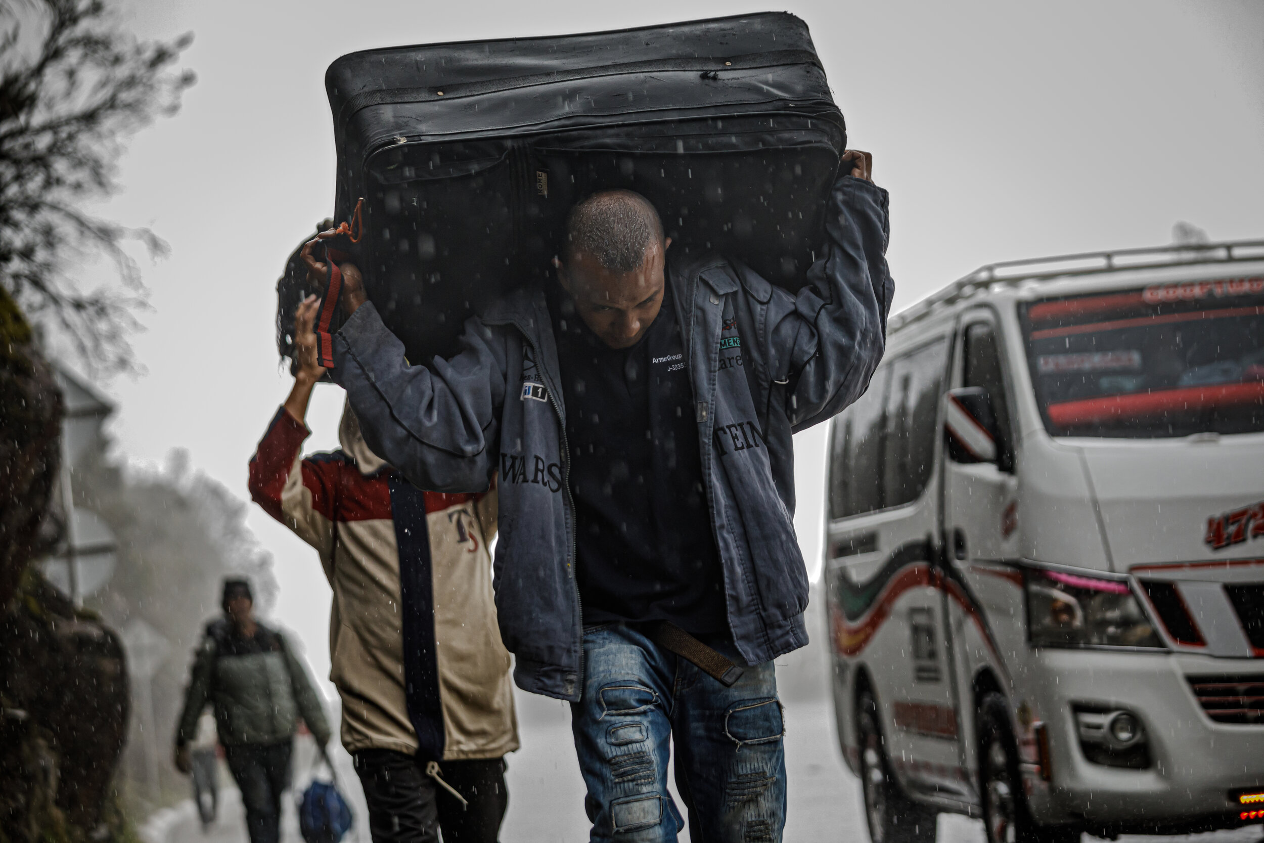  Through the rain and cold and carrying their worldly possessions - Venezuelans migrants walk the perilous journey through the cold plateau, known as El Pramo de Berln the most dangerous part of the Andes to get to the other side, towards Bucaraman