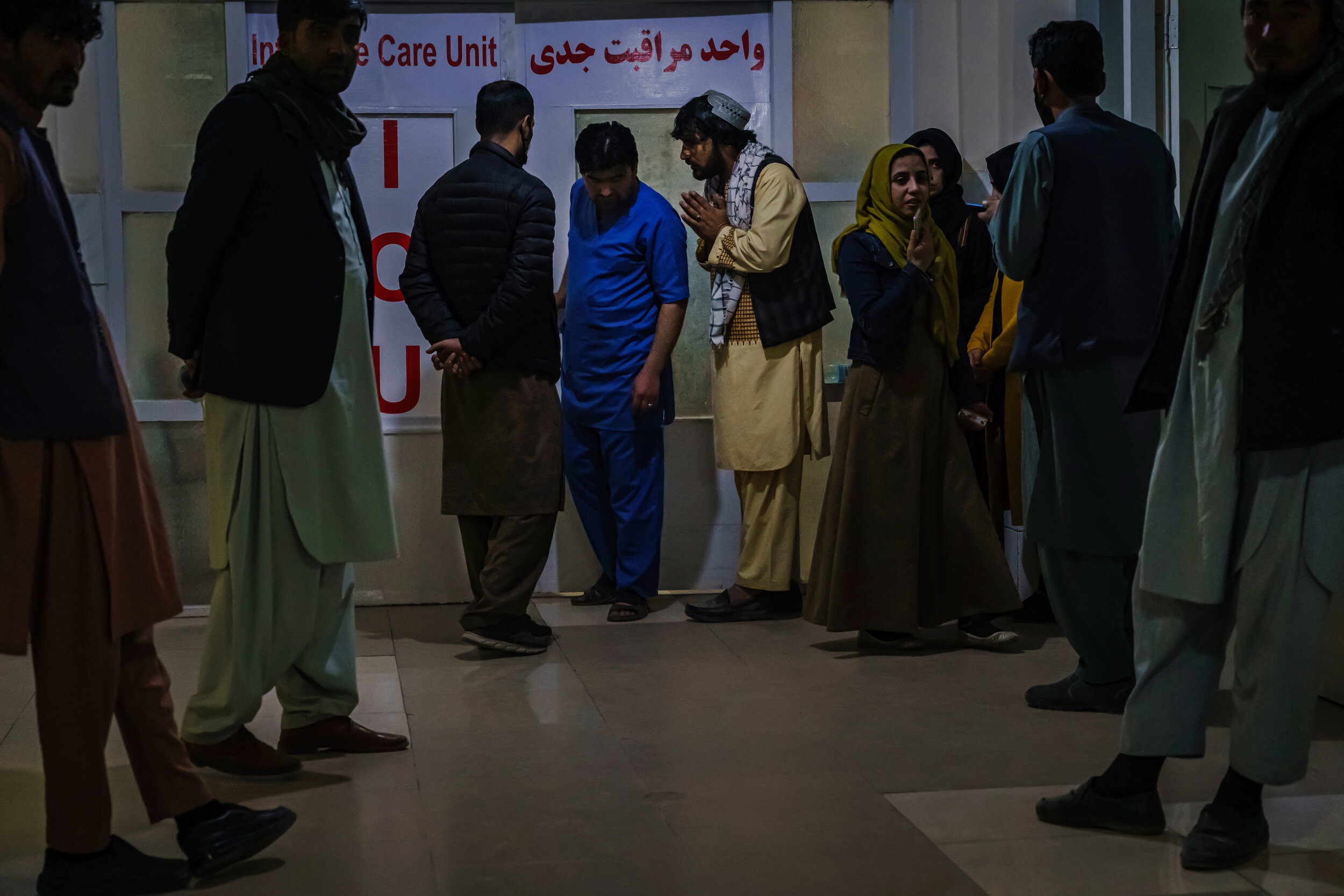  At Ali Abad Hospital, family members beg officials to be reunited with their loved ones, after casualties were rushed to local hospitals after a recent attack on Kabul University, Afghanistans largest university, where three gunmen fired weapons and