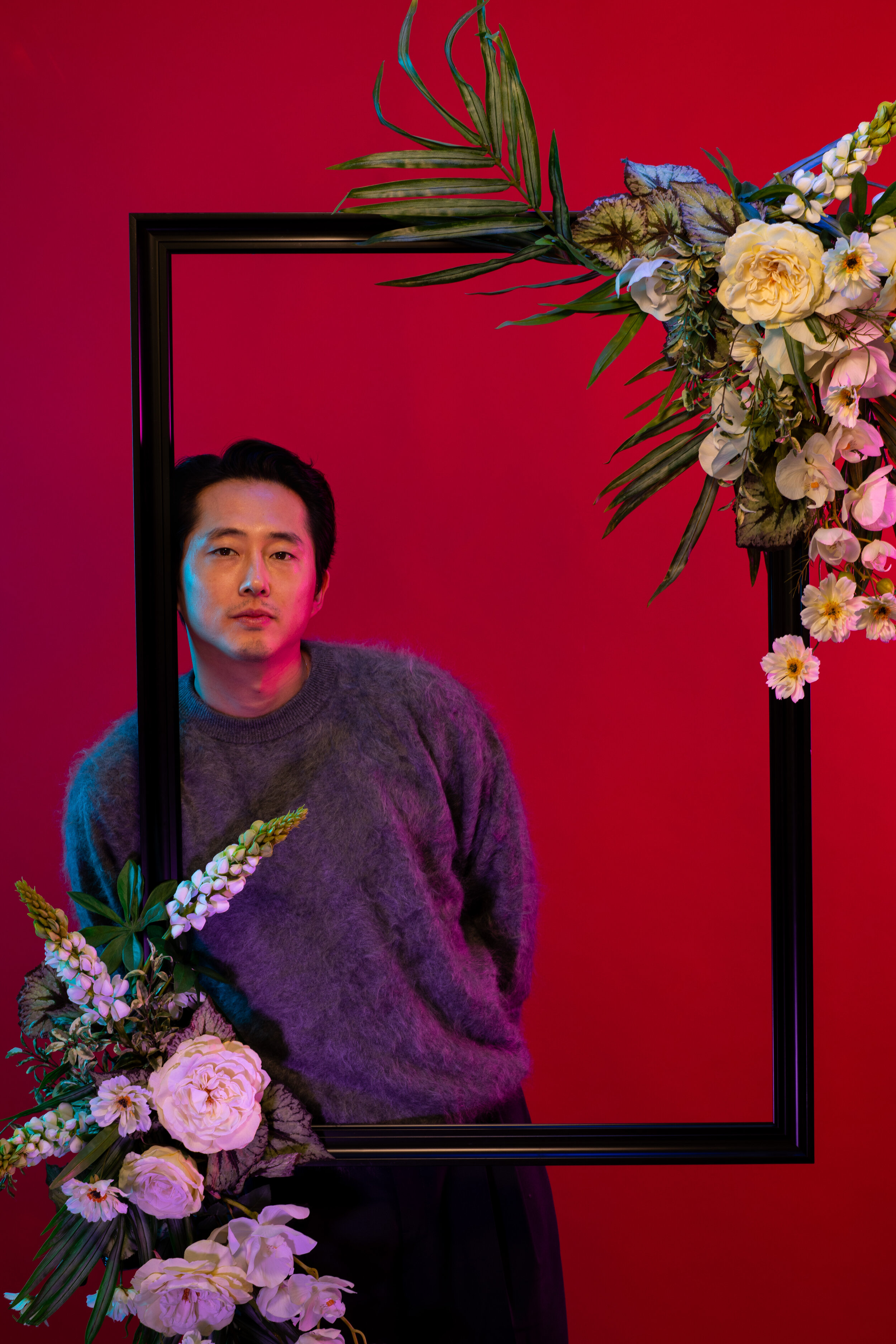  Actor Steven Yeun is photographed  in promotion of the film, “Minari,” in the driveway, of a Pasadena, CA, home, on Wednesday, Nov. 11, 2020. Yeun portrays the father of a Korean-American family that moves to a tiny farm in Arkansas in search of bet