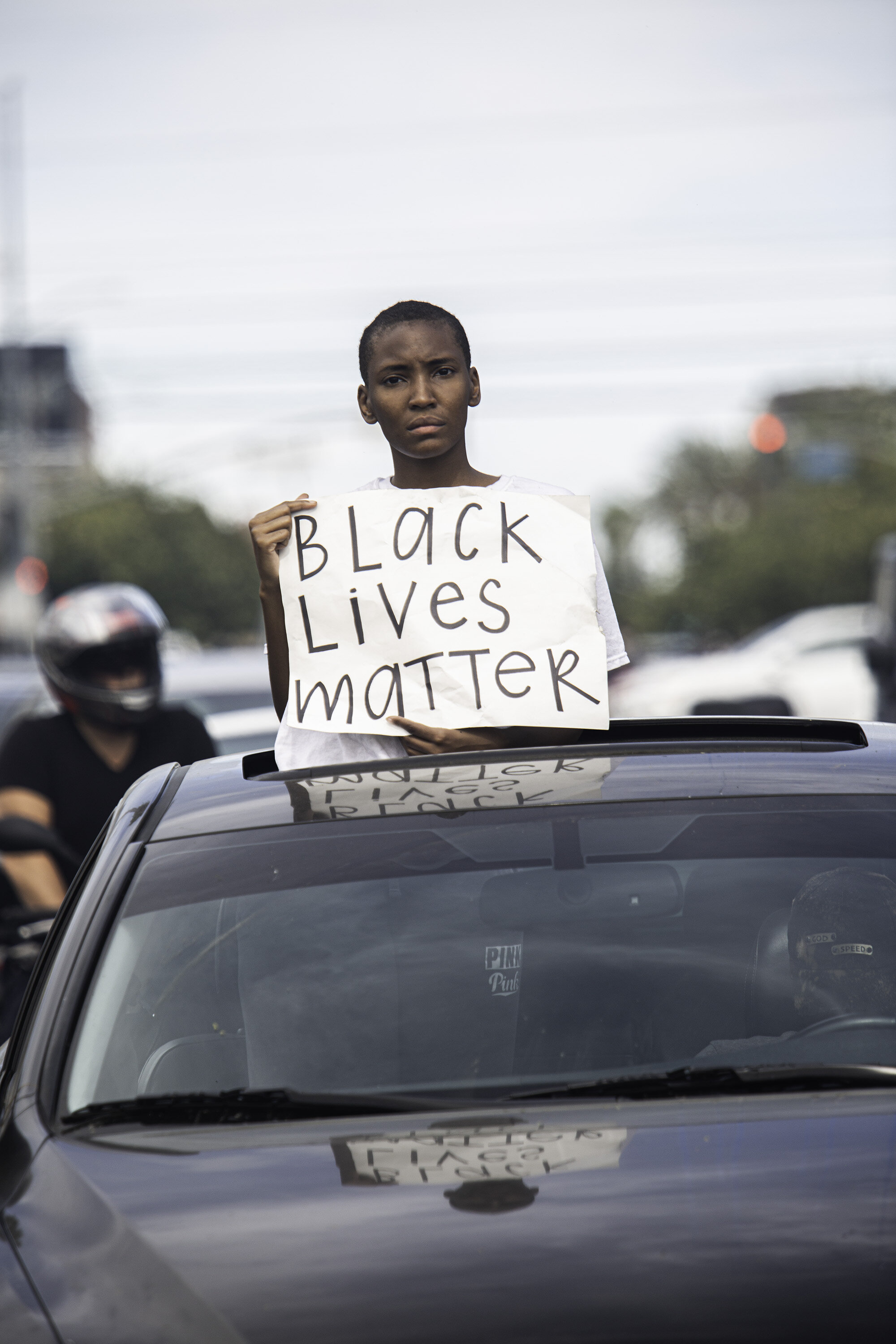  A young protester holds a Black Lives Matter sign on Saturday, May 30, 2020, in Los Angeles, California. The killing by police of George Floyd in Minneapolis, MN on May 25, triggered nationwide protests.  