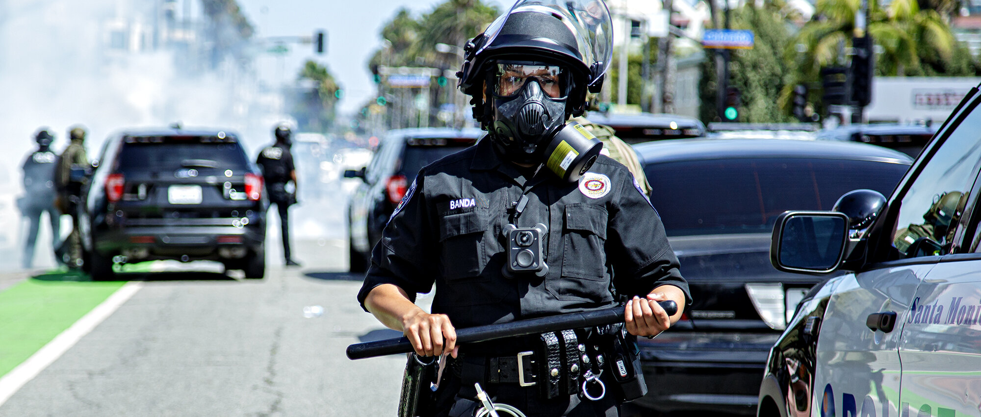  A Culver City police officer holds the line as other police officers use tear gas to disperse protesters on Ocean Avenue, Santa Monica, Calif., on Sunday, May 31, 2020. Other Los Angeles area police forces, including Culver City and Beverly Hills, s