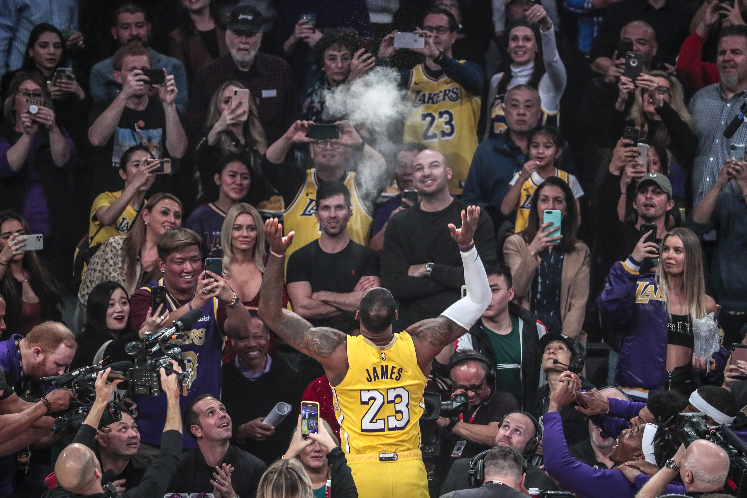  LOS ANGELES, CA, FRIDAY, JANUARY 3, 2020 - Los the New Orlea Angeles Lakers guard LeBron James flips powder in the air during a pre-game ritual in front of rapt fans before a game against the New Orleans Pelicans at Staples Center.   