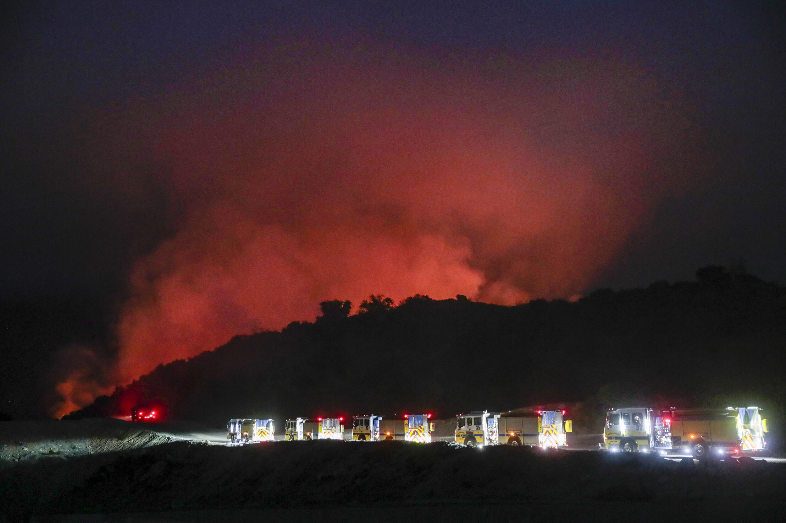  A phalanx of Ventura County Fire engines heads to an active front burning near Arcadia, CA. The Bobcat Fire  burned 115,796 acres in the central San Gabriel Mountains, in and around the Angeles National Forest. It was one of the largest fires on rec