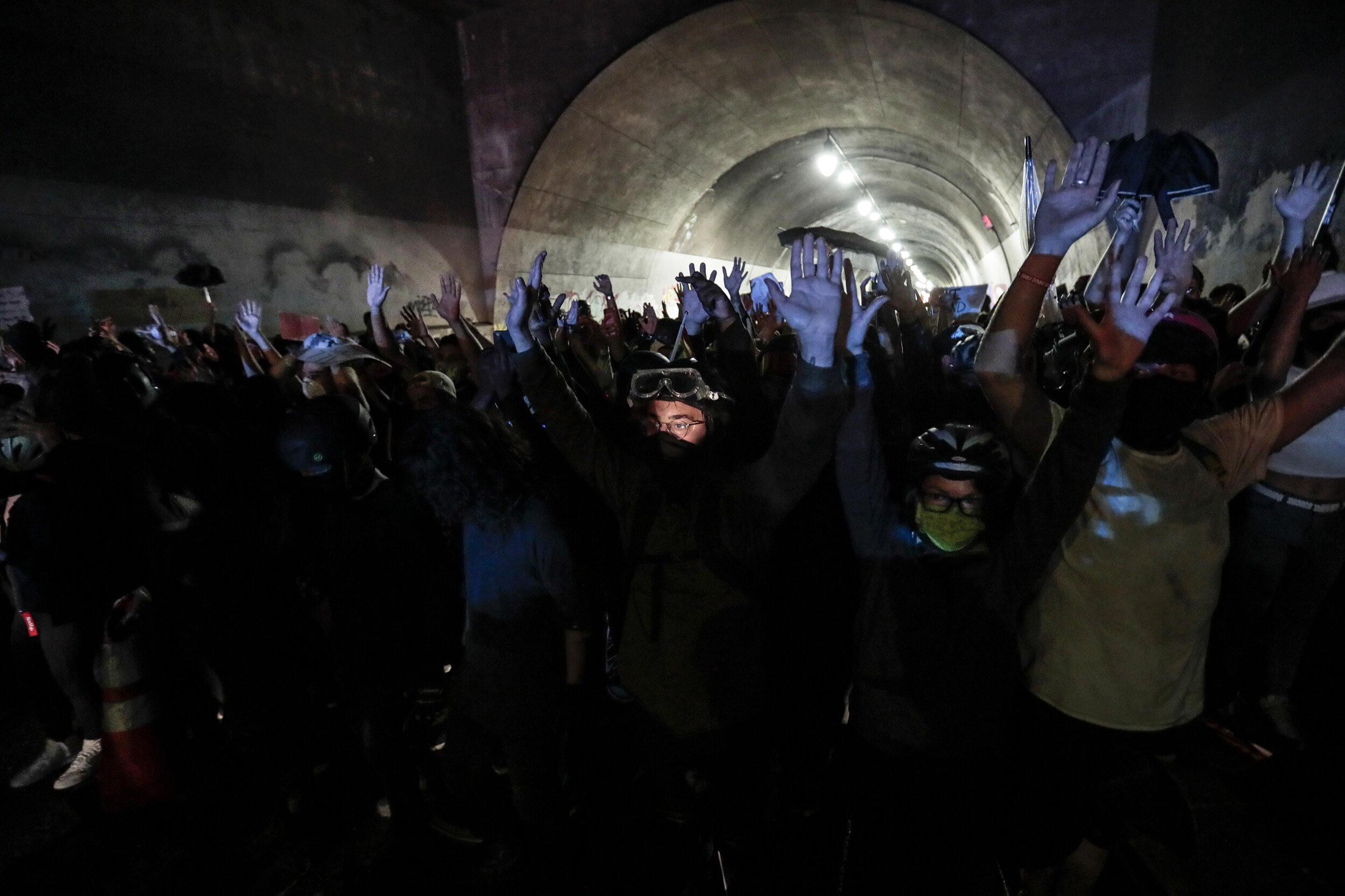  Protesters raise their hands as LAPD officers converge on them from both sides in the Third St. underpass, August 26.According to Wikipedia - Polls in summer 2020 estimated that between 15 million and 26 million people had participated at some point