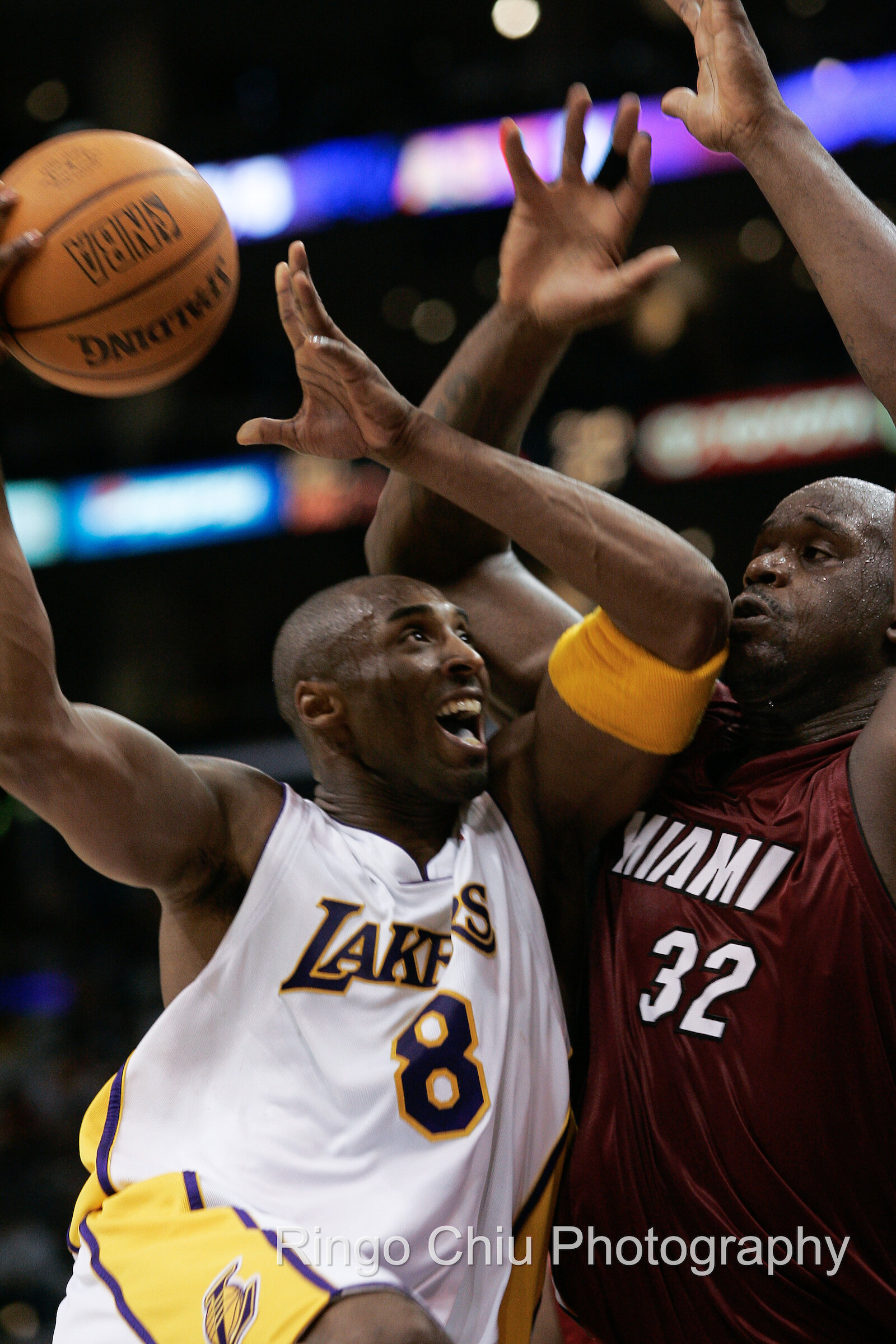  2010: Los Angeles Lakers' Kobe Bryant puts up a shot against Shaquille O'Neal of the Miami Heat during a NBA basketball game in Los Angeles. 