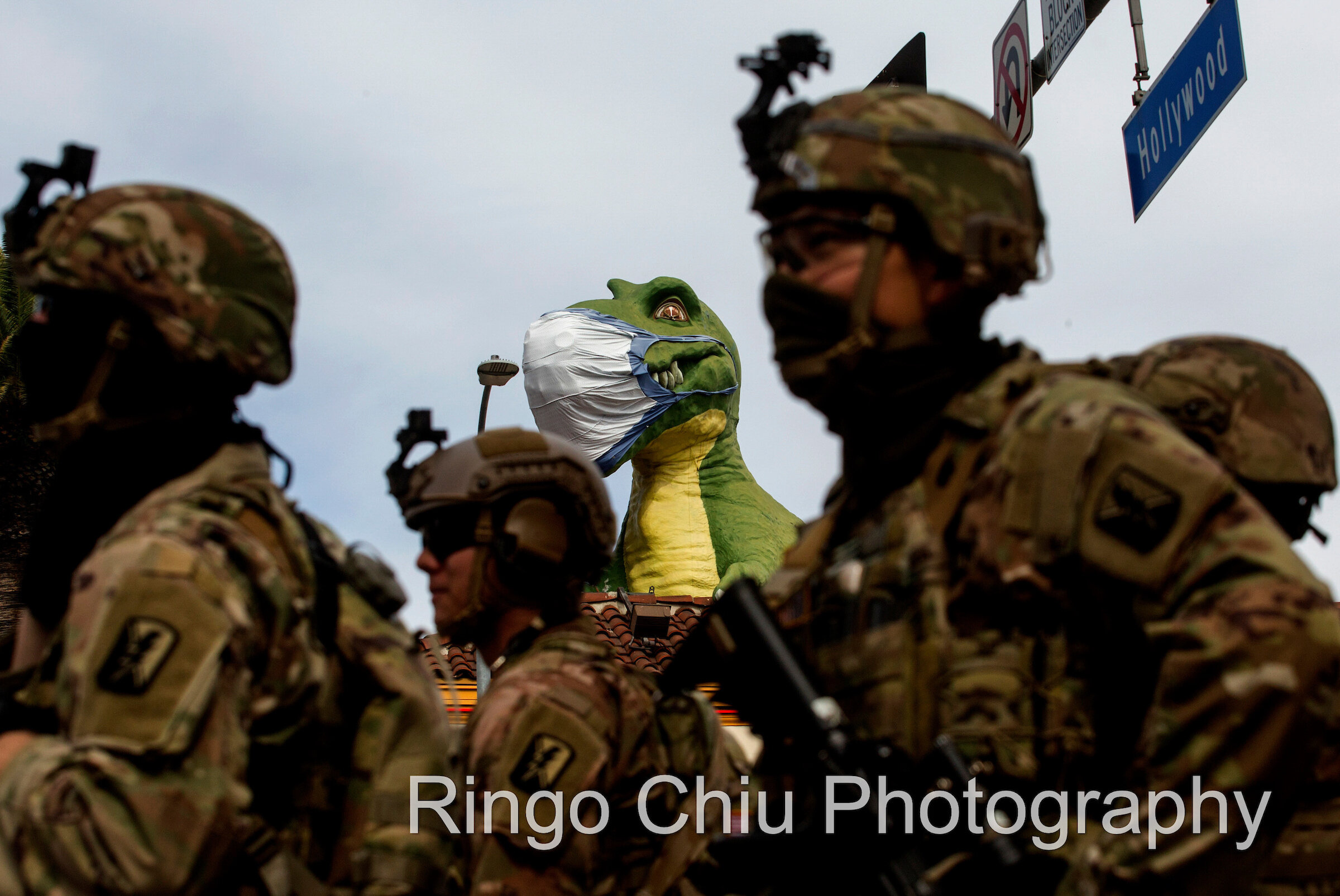  Members of National Guard stand guard in front of Hollywood's Ripley's Believe It or Not! during a protest over the death of George Floyd, who died after he was restrained by Minneapolis police on Memorial Day, Tuesday, June 2, 2020, in Los Angeles.