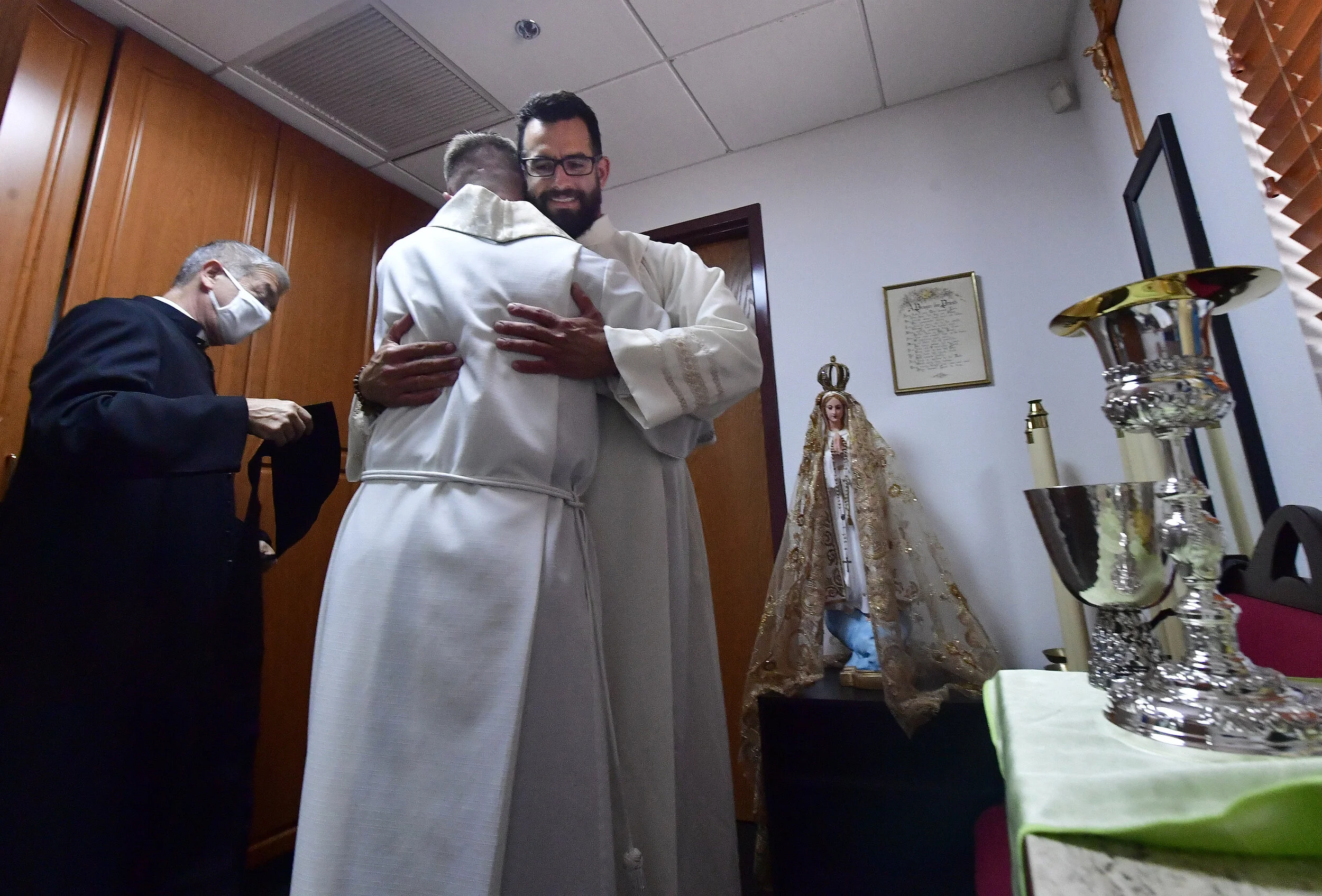  Deacon Ian Francisco Hollick, 34 from Corona, is greeted by priests prior to his Ordination to the Priesthood mass at Sacred Heart Church in Rancho Cucamonga Saturday morning May 29, 2021. Father Ian Hollick was assigned to the St. Martha Parish in 