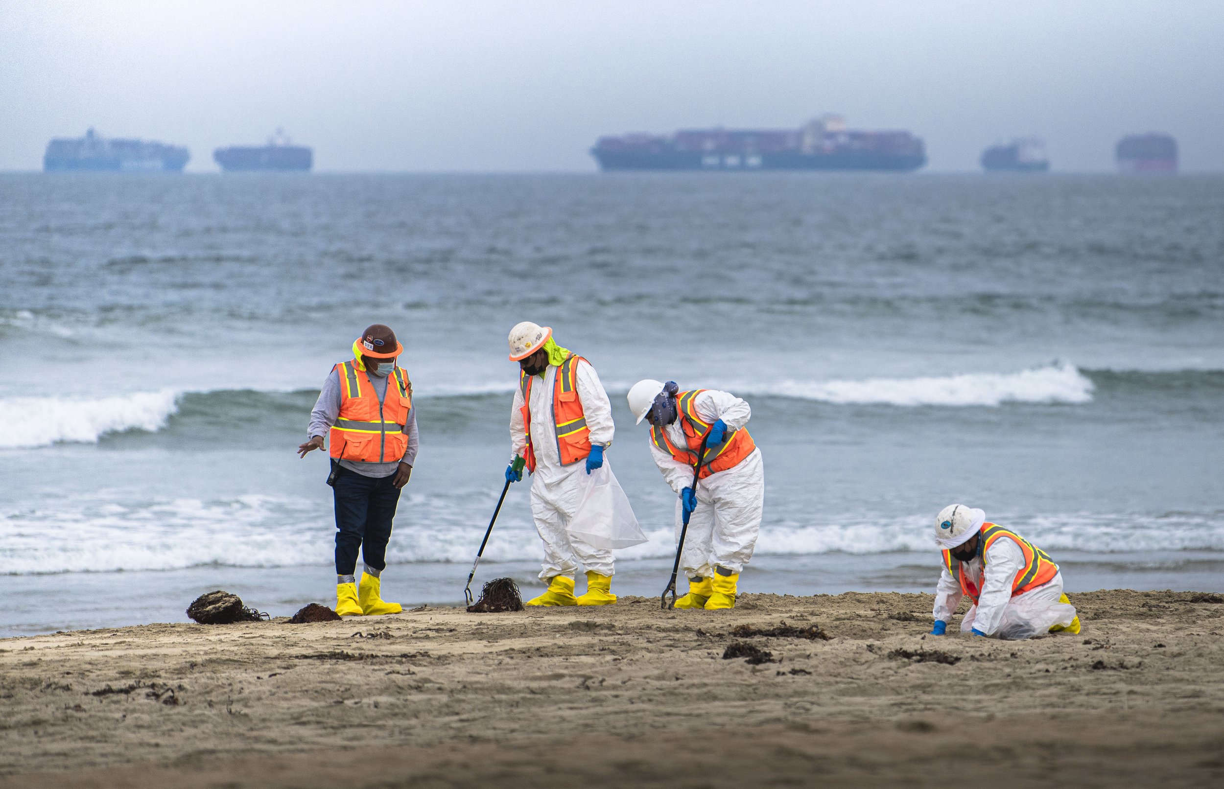  Cleanup crews from the US Ecology agency, the leading provider of environmental, emergency and disaster response check the beach's of Huntington Beach, Calif for any washed up oil after the recent oil spill that occured in Orange County, Calif. on O
