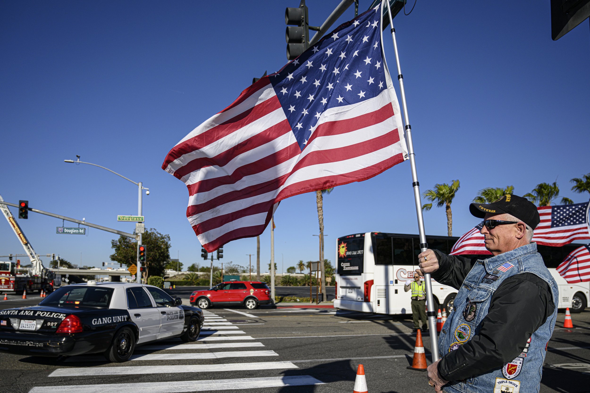  Ray Trosper, a Marine veteran with the Patriot Guard Riders, shows support for Huntington Beach Police Officer Nicholas Vella, who died in a helicopter crash Feb. 19 off the waters in Newport Beach. Funeral services were at the Honda Center in Anahe