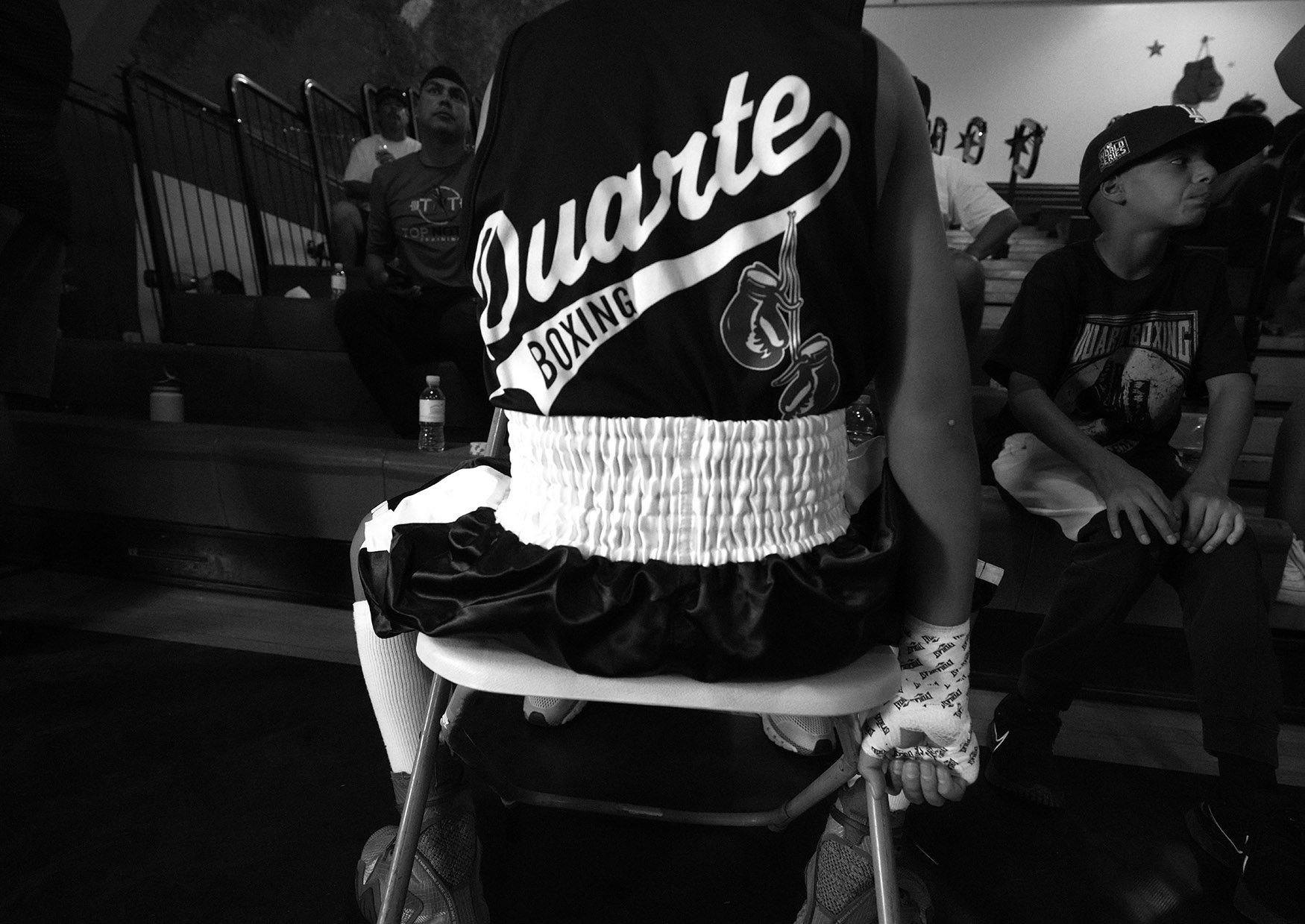  Boxer Benjamin Valenzuela has his hands taped prior to his bout during the annual amateur boxing show staged by the Duarte Boxing Club at Duarte High School in Duarte on Saturday, August 13, 2022.  