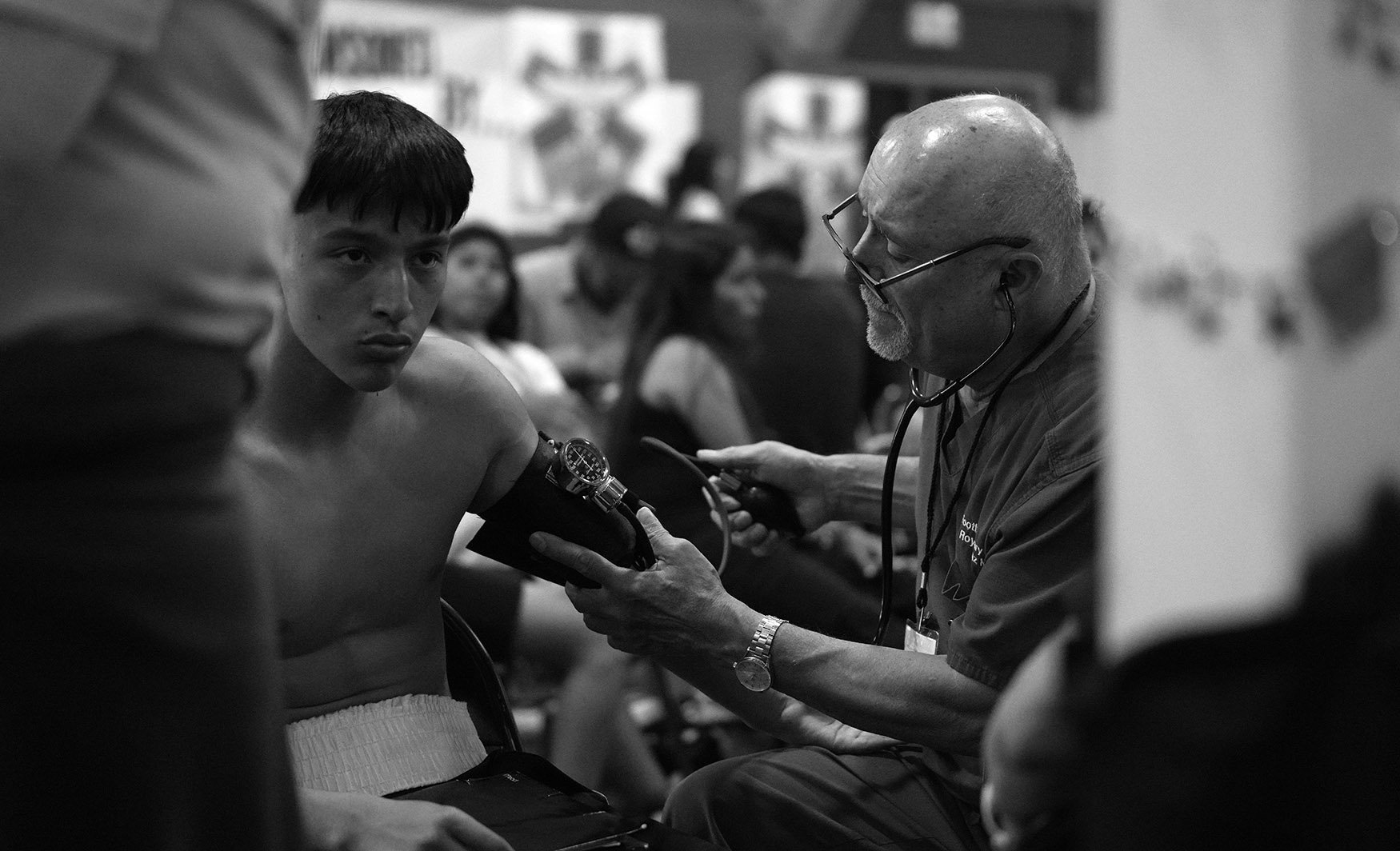  Medical staff checks out a boxer prior to a bout during the annual amateur boxing show staged by the Duarte Boxing Club at Duarte High School in Duarte on Saturday, August 13, 2022.  