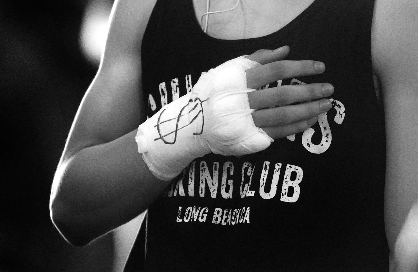  A boxer with the money sign on his tapered hands during the annual amateur boxing show staged by the Duarte Boxing Club at Duarte High School in Duarte on Saturday, August 13, 2022.  