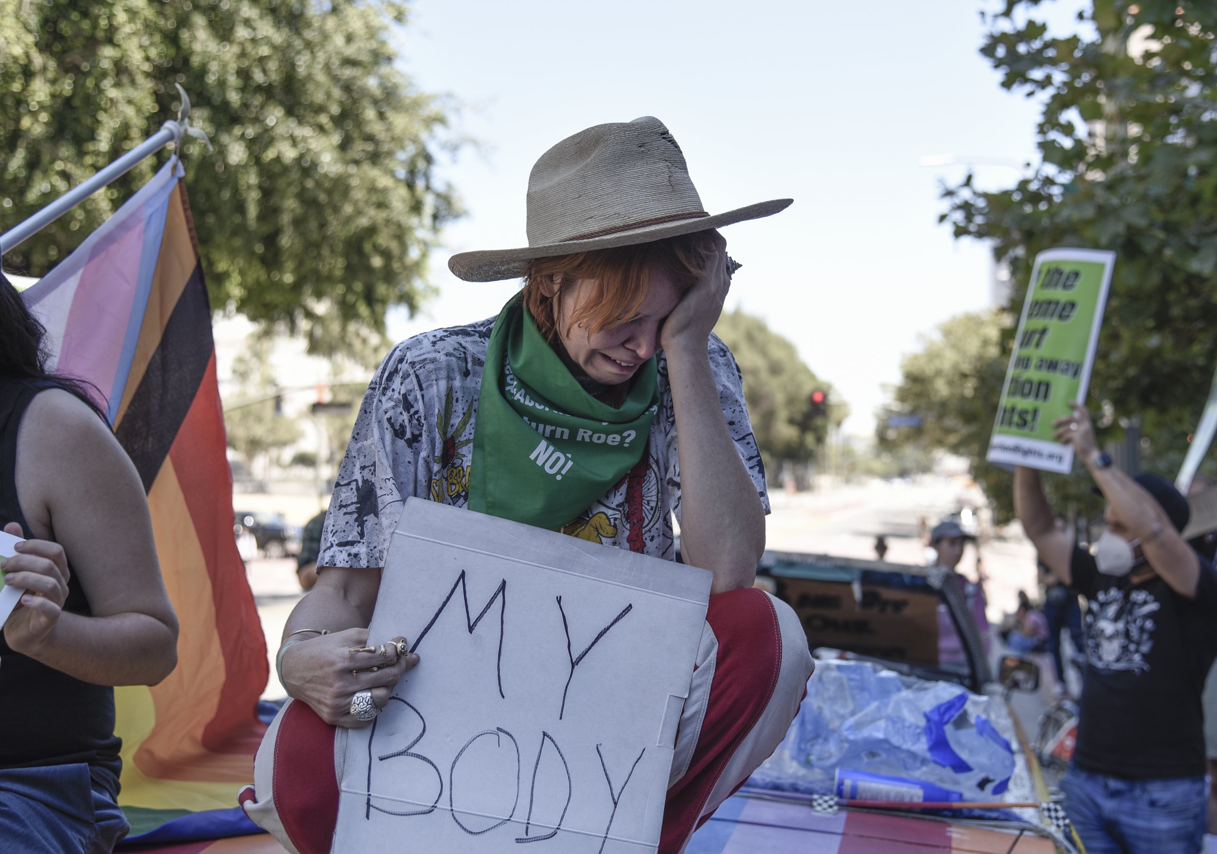  Protestor Eleanor Wells, a sexual violence survivor, mourns the Supreme Court's decision that "The Constitution does not confer a right to abortion; Roe and Casey are overruled; and the authority to regulate abortion is returned to the people and th