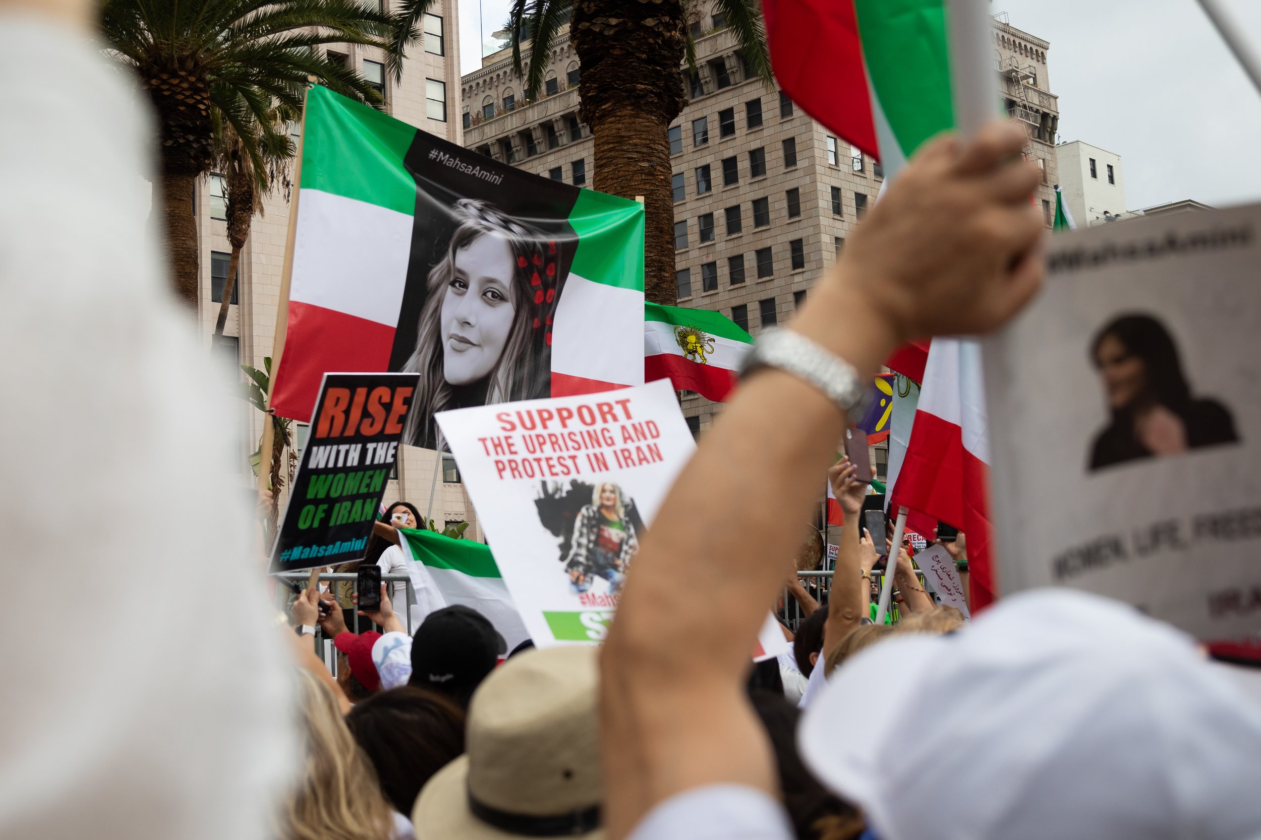  Rally goers holding a banner with a picture of Mahsa Amini during the fourth Freedom for Iran protest to take place in the Los Angeles area. These protests are part of a global movement calling for regime change in Iran over the death of Mahsa Amini