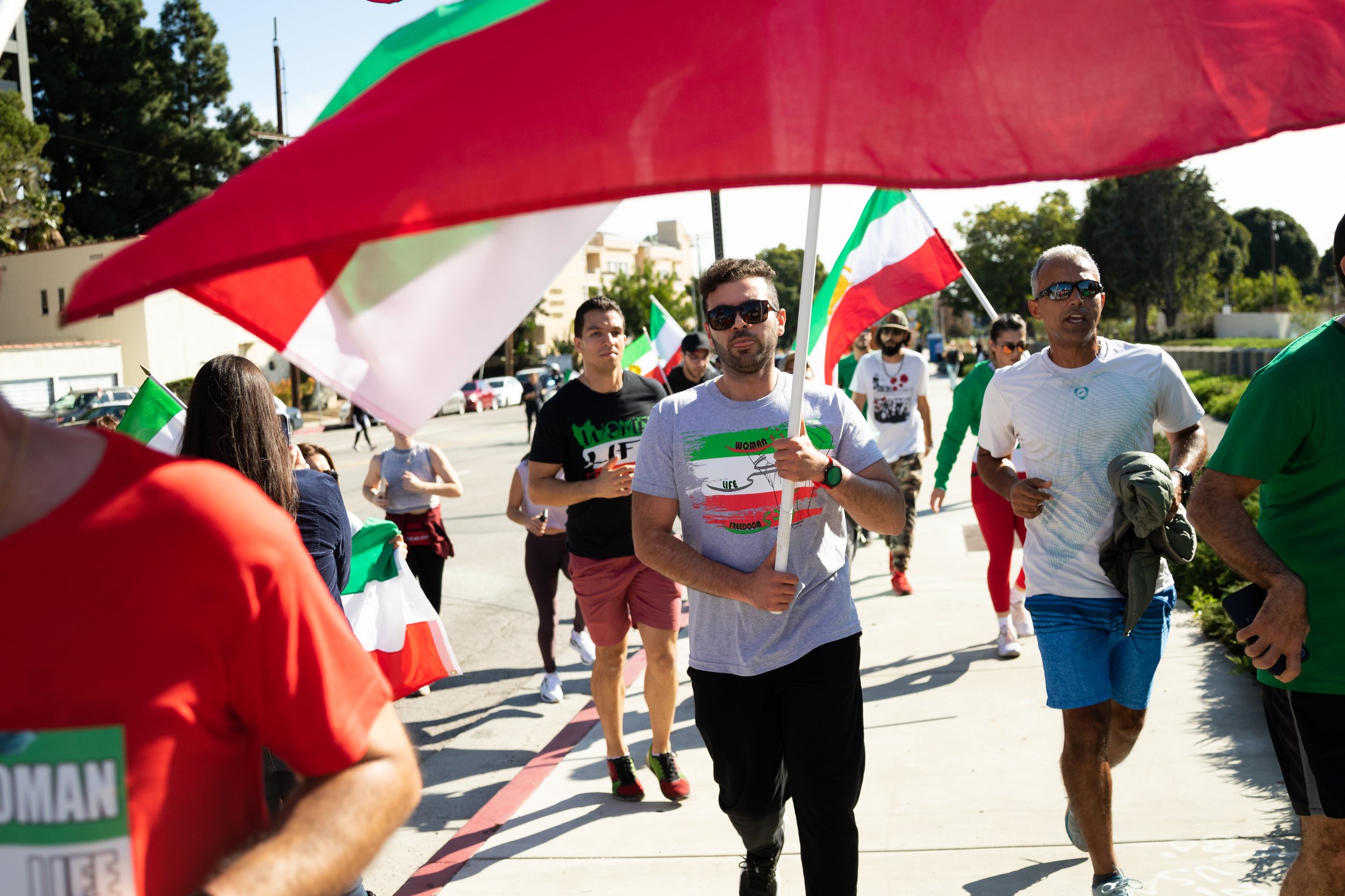  Darush Morid finishing a one and half mile run in solidarity with the on-going protest in Iran near the Wilshire Federal Building, in Los Angeles, Calif. on Saturday, Dec. 3, 2022. This was the lastest demonstration to take place in Los Angeles sinc