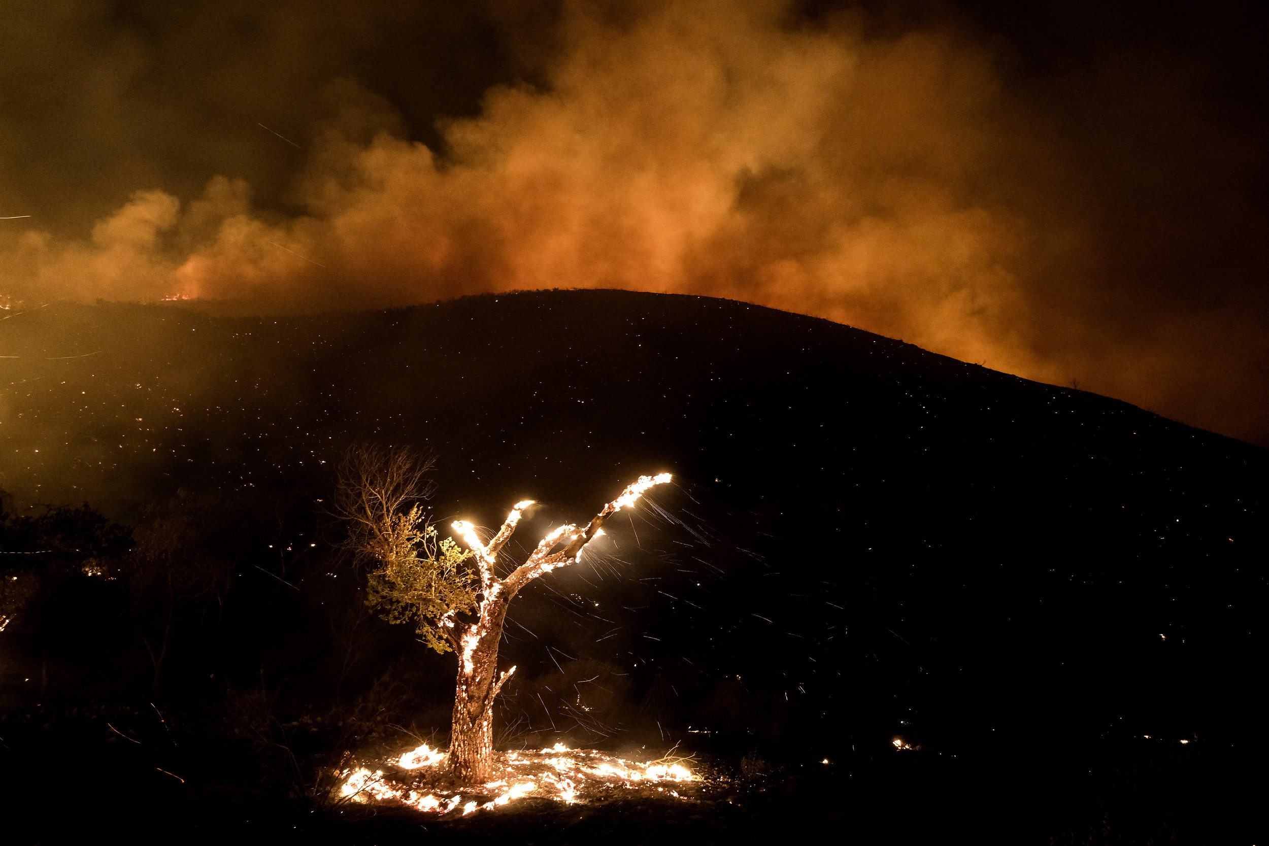 FIRE - SECOND PLACE: RINGO CHIU FOR THE ASSOCIATED PRESS