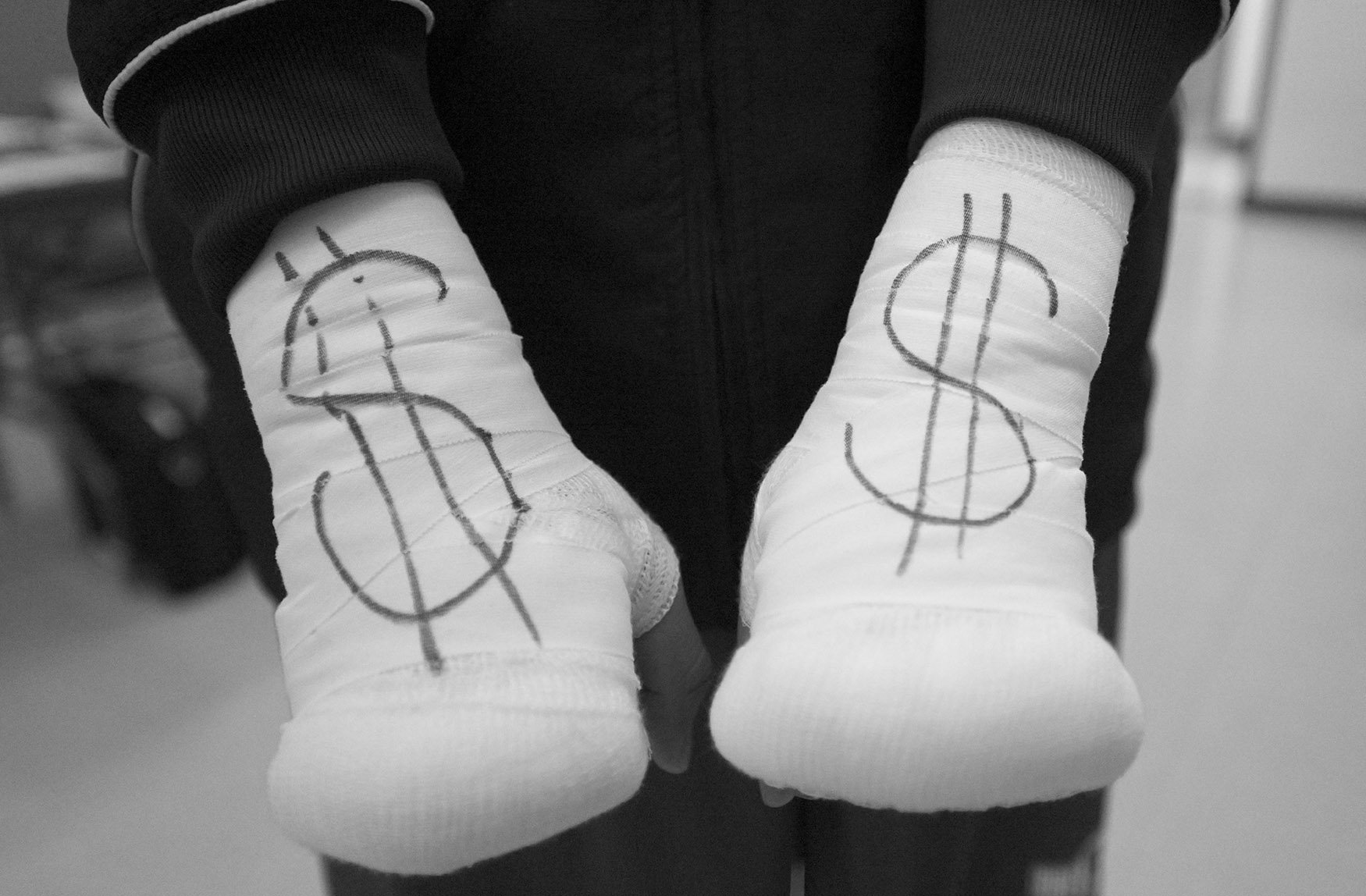  Boxer Roger Gomez-Peralta of the Villa Parke Boxing of Pasadena shows off his Money sings on his taped hands prior to his bout during the Golden Gloves competition at Loma Alta Park in Altadena on Thursday, February 23, 2023.  