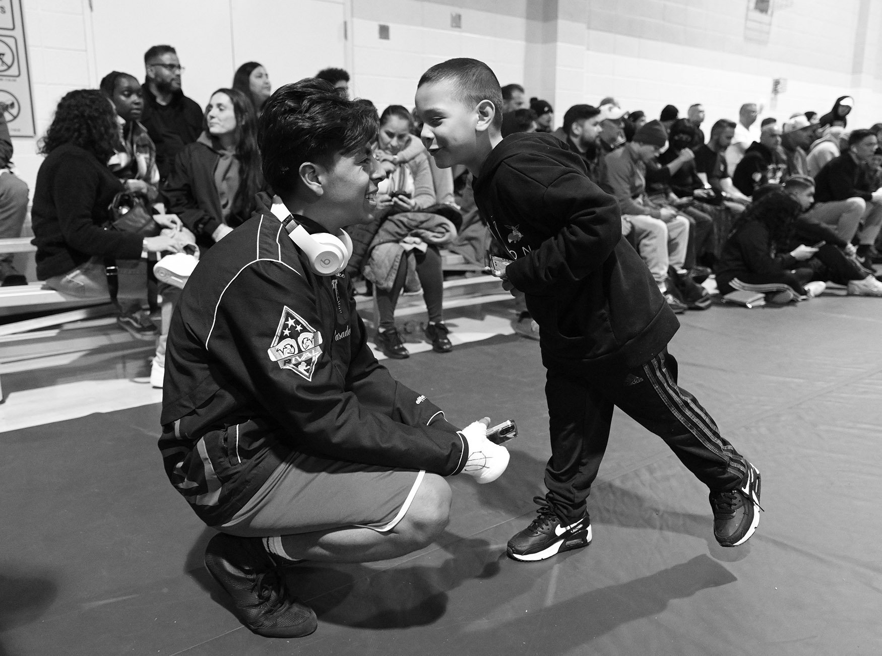  Boxer Roger Gomez-Peralta of the Villa Parke Boxing of Pasadena shares a laugh with his cousin Angel Peralta during the Golden Gloves competition at Loma Alta Park in Altadena on Thursday, February 23, 2023.  