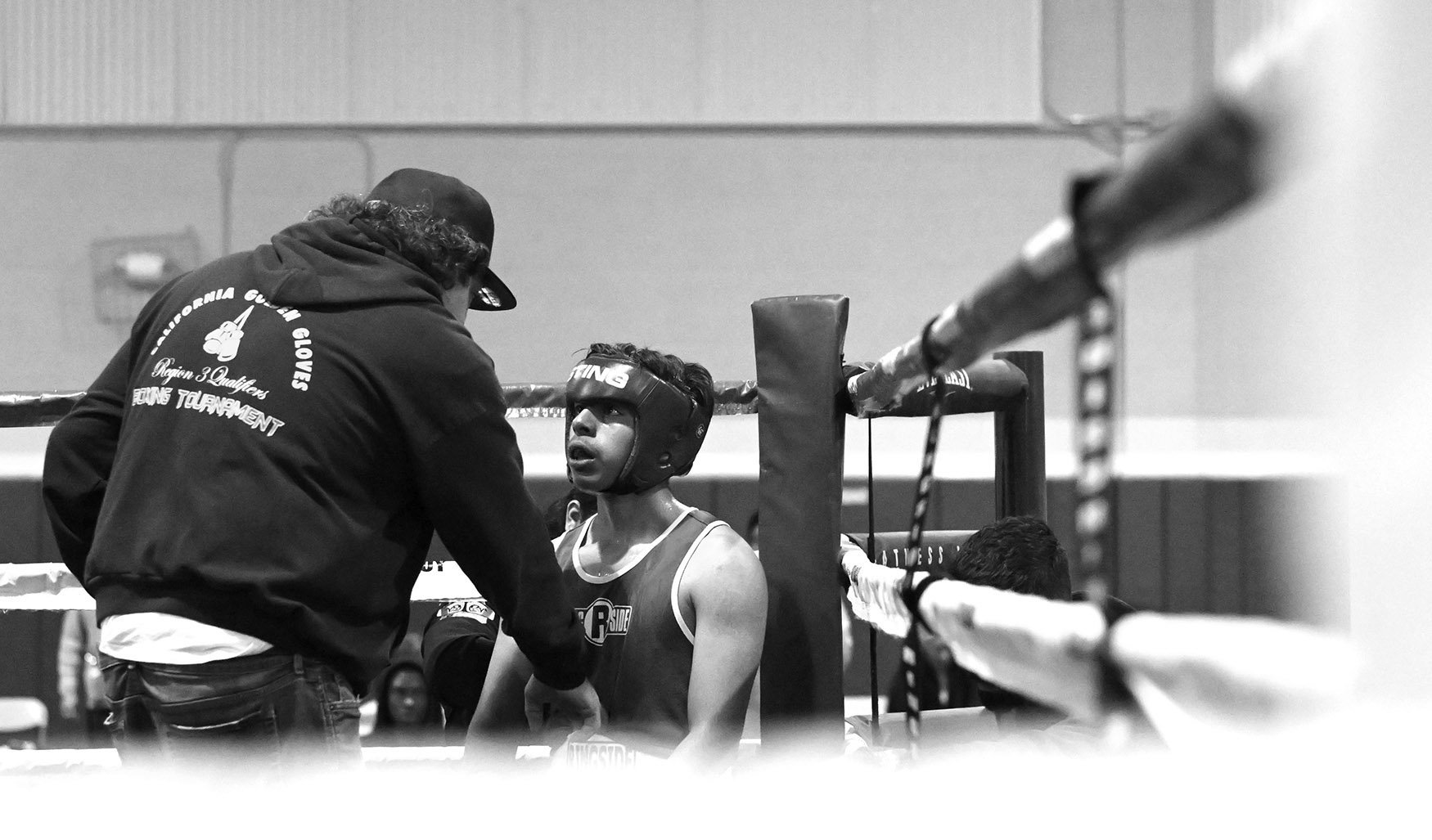  Boxer Roger Gomez-Peralta of the Villa Parke Boxing of Pasadena listens to coach Fausto De La Torre between rounds as Gomez defeated Javier Aguilar of the Azusa Boxing Club during the Golden Gloves competition at Loma Alta Park in Altadena on Thursd