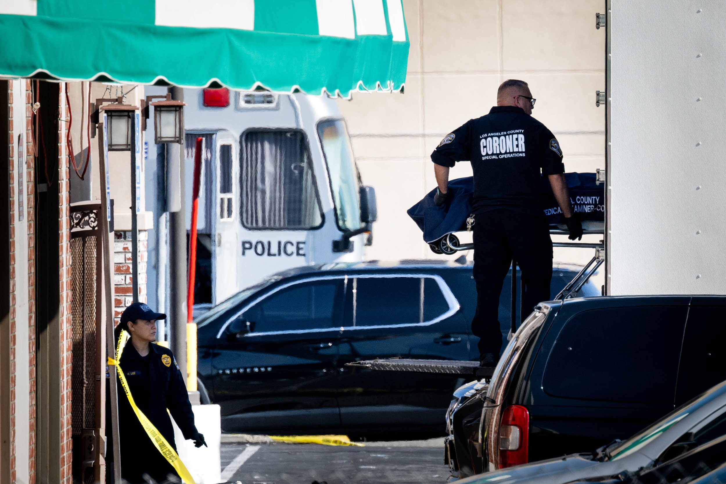  Los Angeles County Coroner removes one of 10 mass shooting victims from Star Ballroom Dance Studio in Monterey Park on Sunday, January 22, 2023. The shooting on Saturday night was near the community’s Lunar New Year festival which was closed down on