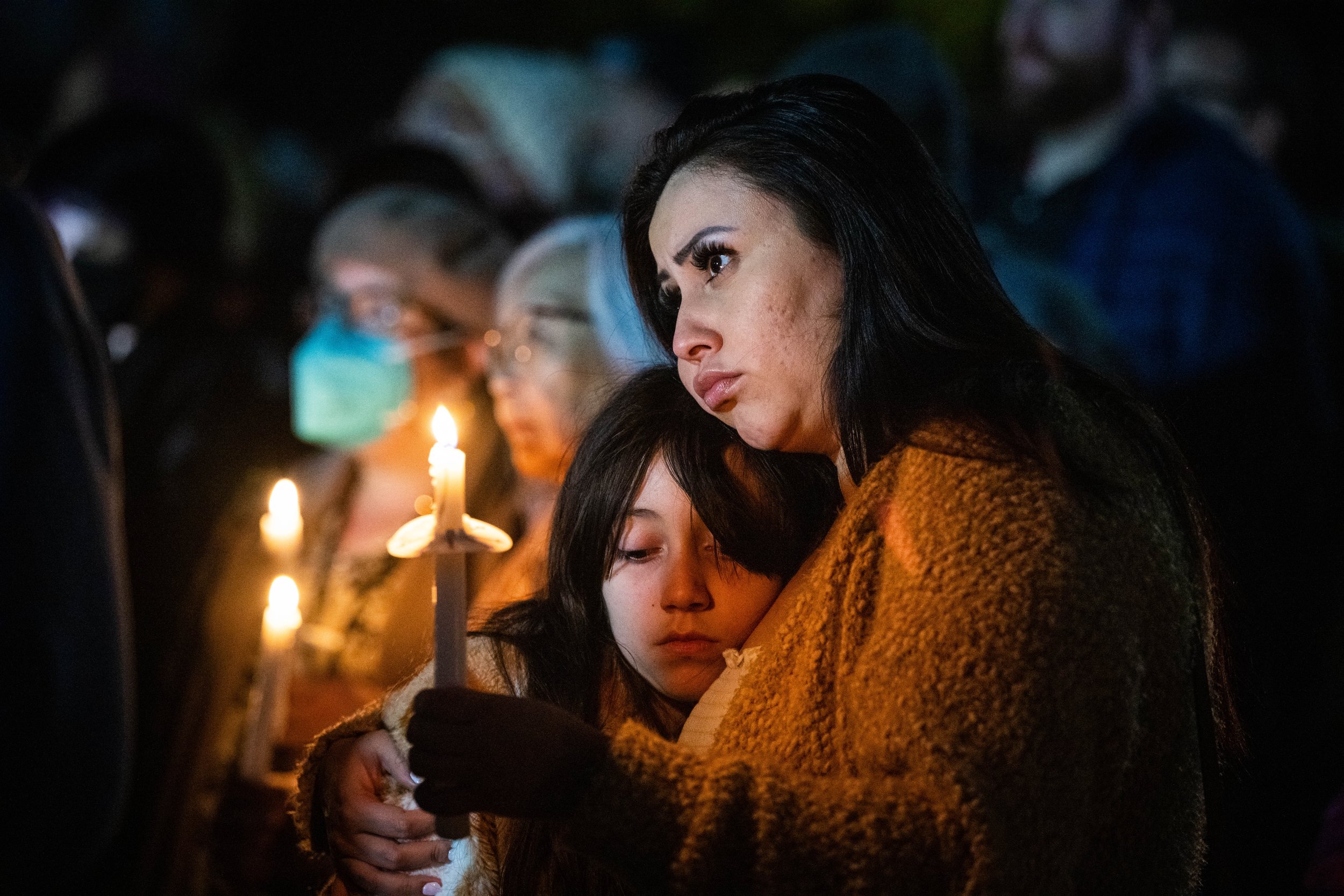  Mourners gather for a candlelight vigil at Monterey Park City Hall on Tuesday, January 24, 2023, to honor the victims of the mass shooting at the Star Ballroom Dance Studio that left 11 people dead and nine others wounded in Monterey Park. 