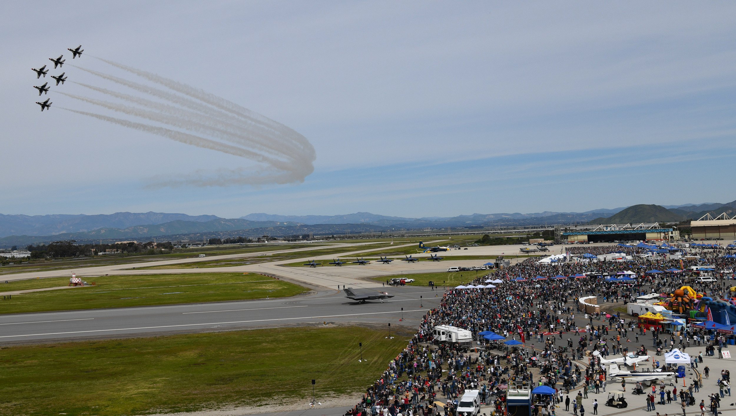 U.S. Air Force Demonstration Squadron, the Thurderbirds, performs in the F/16 Fighter Falcons at the Point Mugu Air Show March 17-19 at Naval Base Ventura County in California. About 205,000 civilians, volunteers, and military personnel attended acr