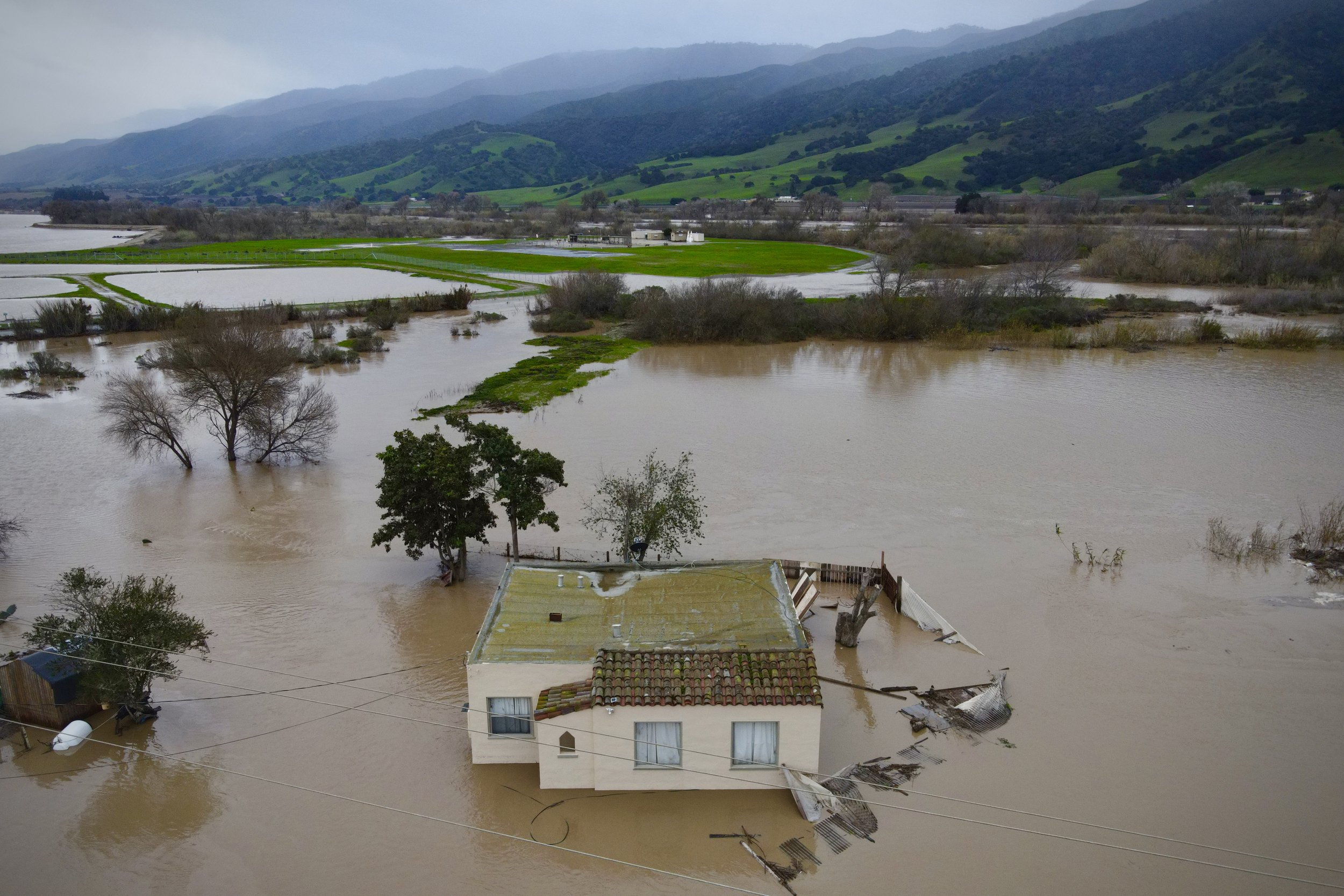  A home on agricultural land is seen amid flooding from the Salinas River in Salinas, California, U.S., January 13, 2023.  