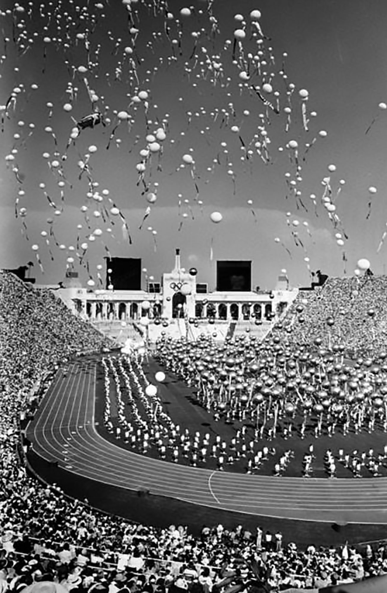  Balloons fill the air as crowds of people are entertained at Opening day ceremonies for the 1984 Olympics on August 17, 1984. (Photo by Dean Musgrove, Los Angeles Herald Examiner) 