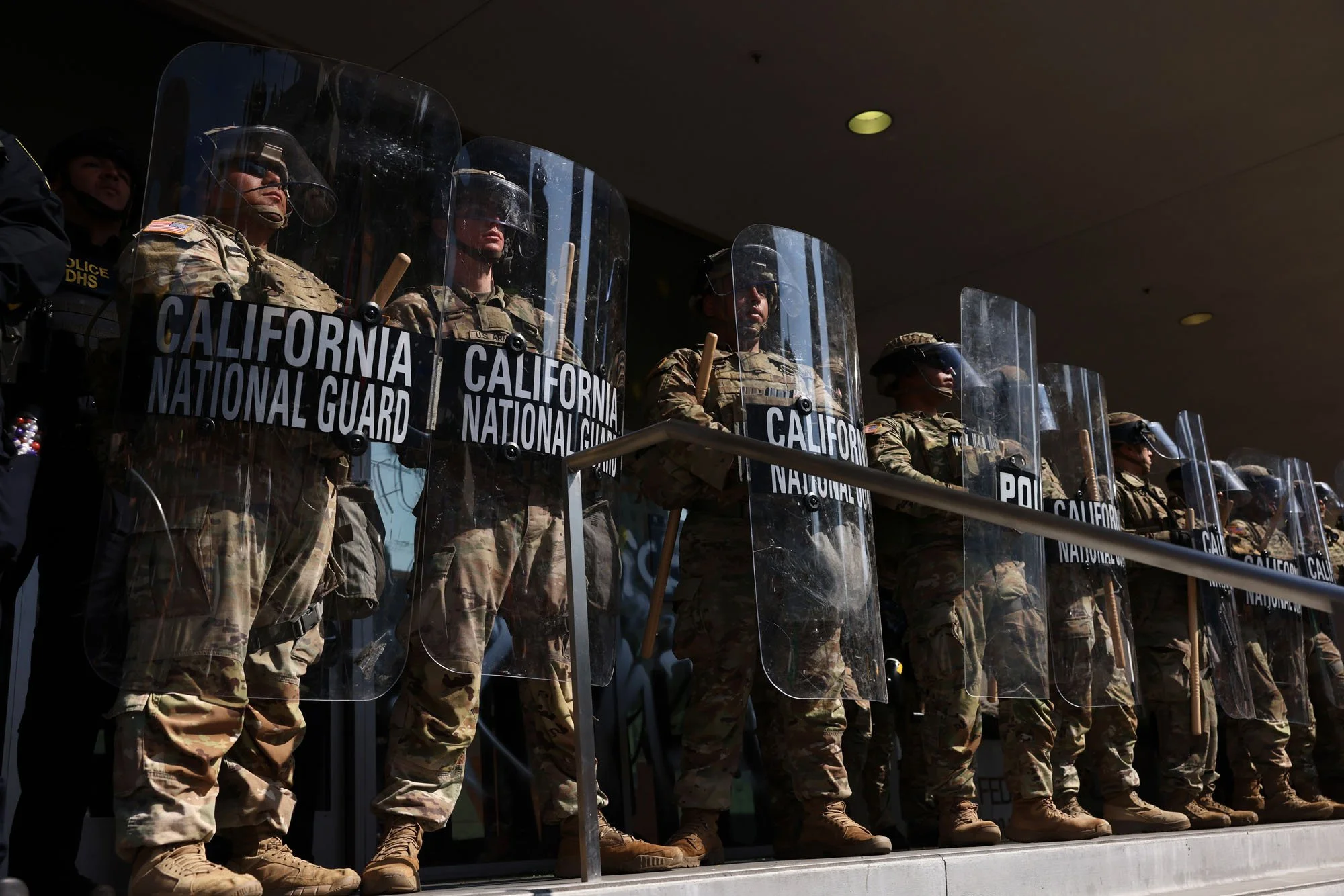  The California National Guard stand outside of the Roybal Federal Building during a protest against federal immigration sweeps, in downtown Los Angeles, California. 