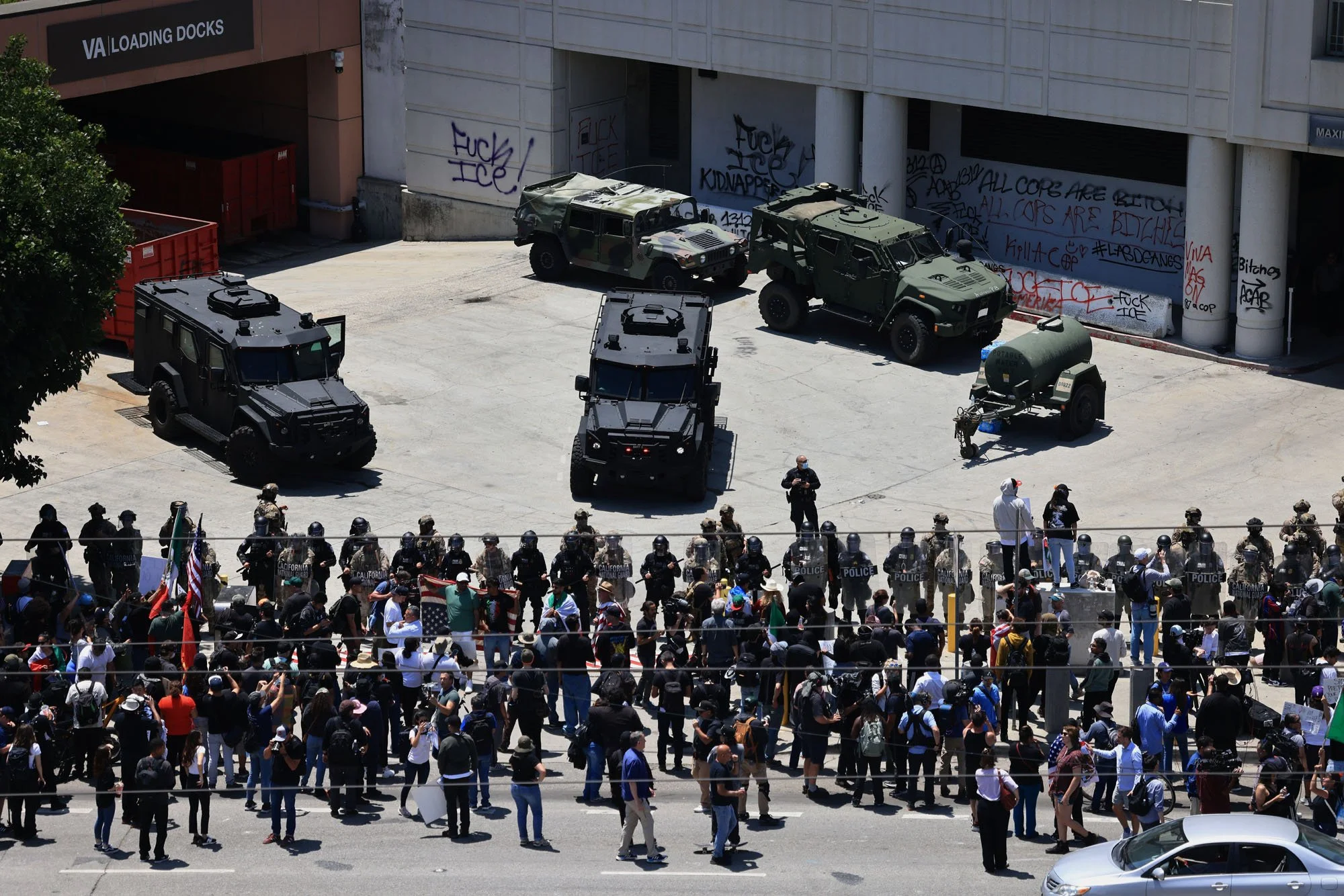  Multiple law enforcement agencies protect the Roybal Federal Building during a protest against federal immigration sweeps, in downtown Los Angeles, California. 