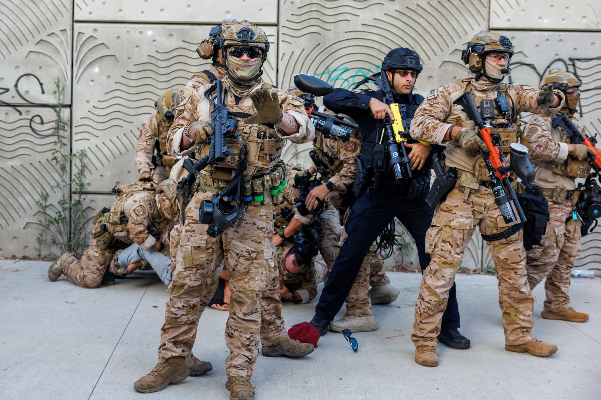  LOS ANGELES, CA - An 8PM curfew was put in effect in Los Angeles after unrest during subsequent days of  protests against immigration raids by ICE.  If protesters defied the curfew and failed to disperse, they were corralled, zip tied and arrested. 