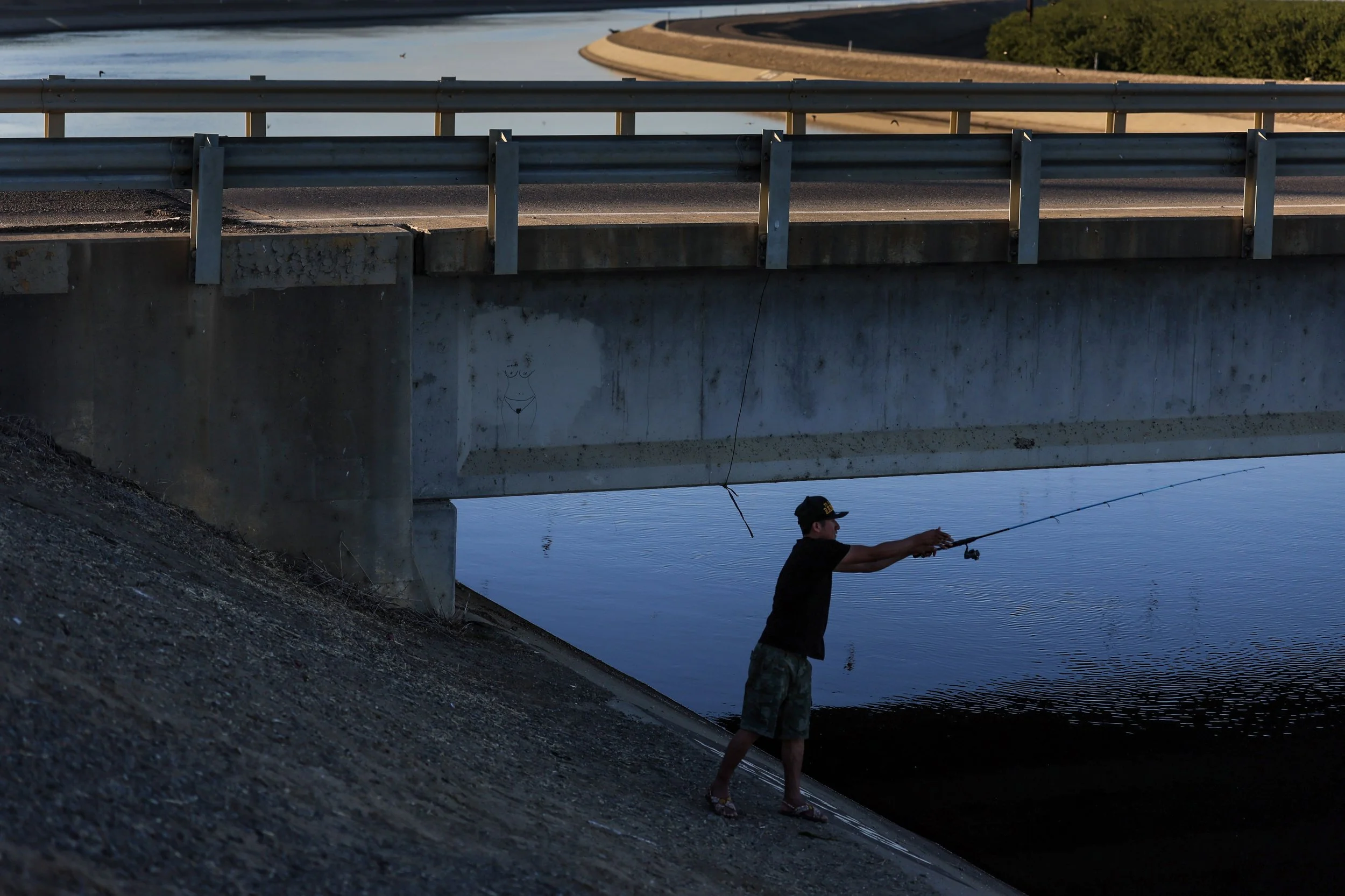  Avenal,,CA, Tuesday, June 17, 2025 - Luis Miguel casts a line along the California Aqueduct at Jayne Ave.  