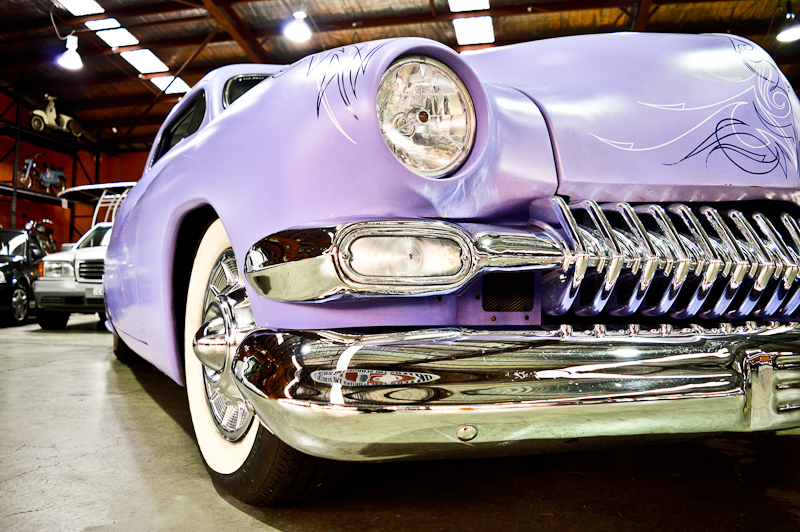 This 1949 Mercury Eight with a 350 Chevy Engine rolled in on to the Showroom floor late last week. Complete with white walls, original bench seats, chrome from head to toe and some wild pin striping work. 