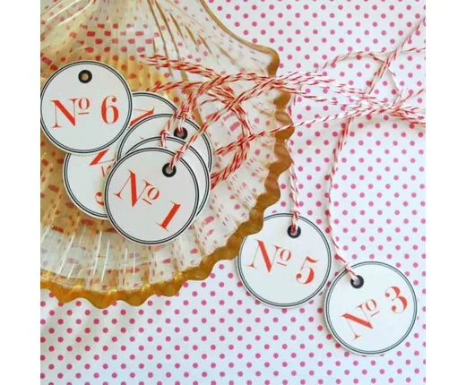 adorable tags from this great Etsy site, May Third , would make the cutest table numbers.