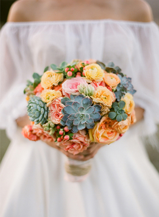 bride with succulent bouquet.jpeg