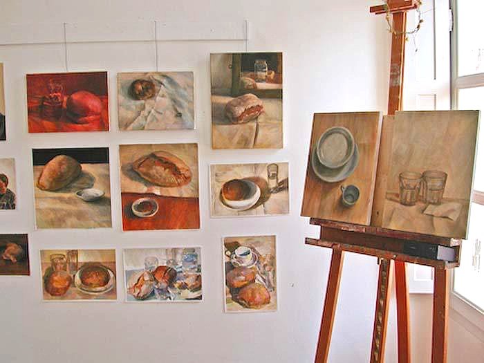 Paintings_in_a_painting_studio.jpg