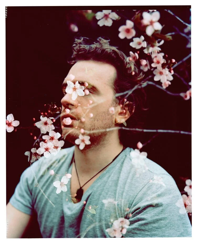 PaulWithFlowers.jpeg