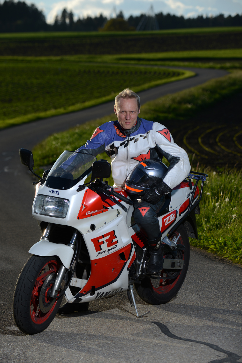 Image of rider and serpentine road in the bag, now its time to play