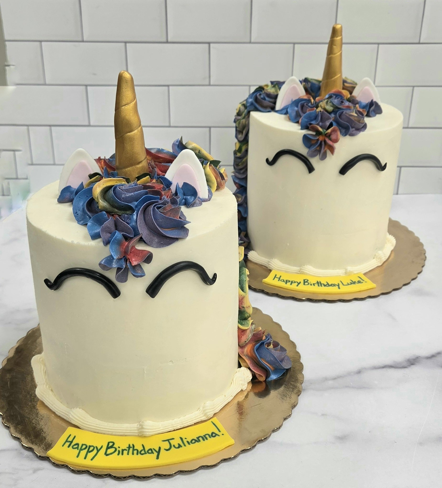 Matching rainbow unicorn cakes for twins!