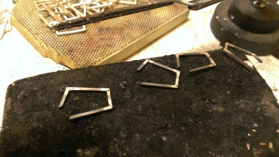 Some links with their corners soldered.